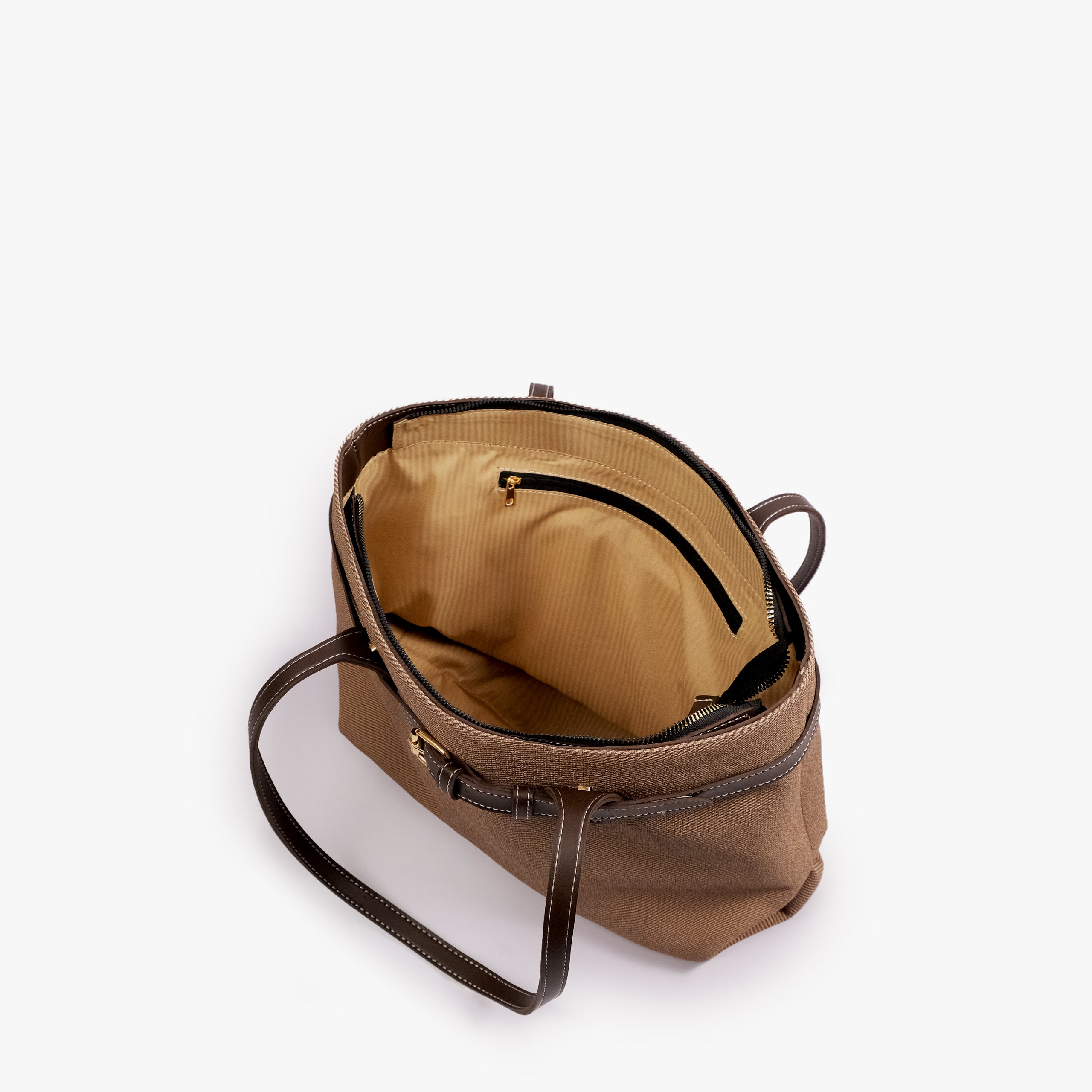 Dark brown belted tote bag — open-top interior view showing the tan interior, structured rim, long handles, and belted front detail, taupe-brown textured body with dark brown smooth faux-leather trim