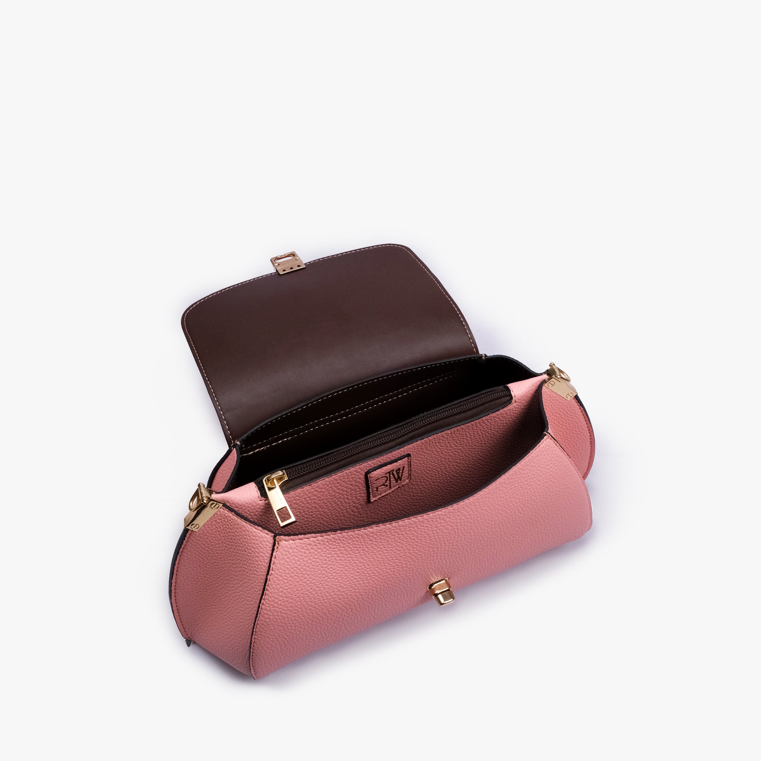 Interior of Blush pink pebble baguette bag showing the zippered main compartment