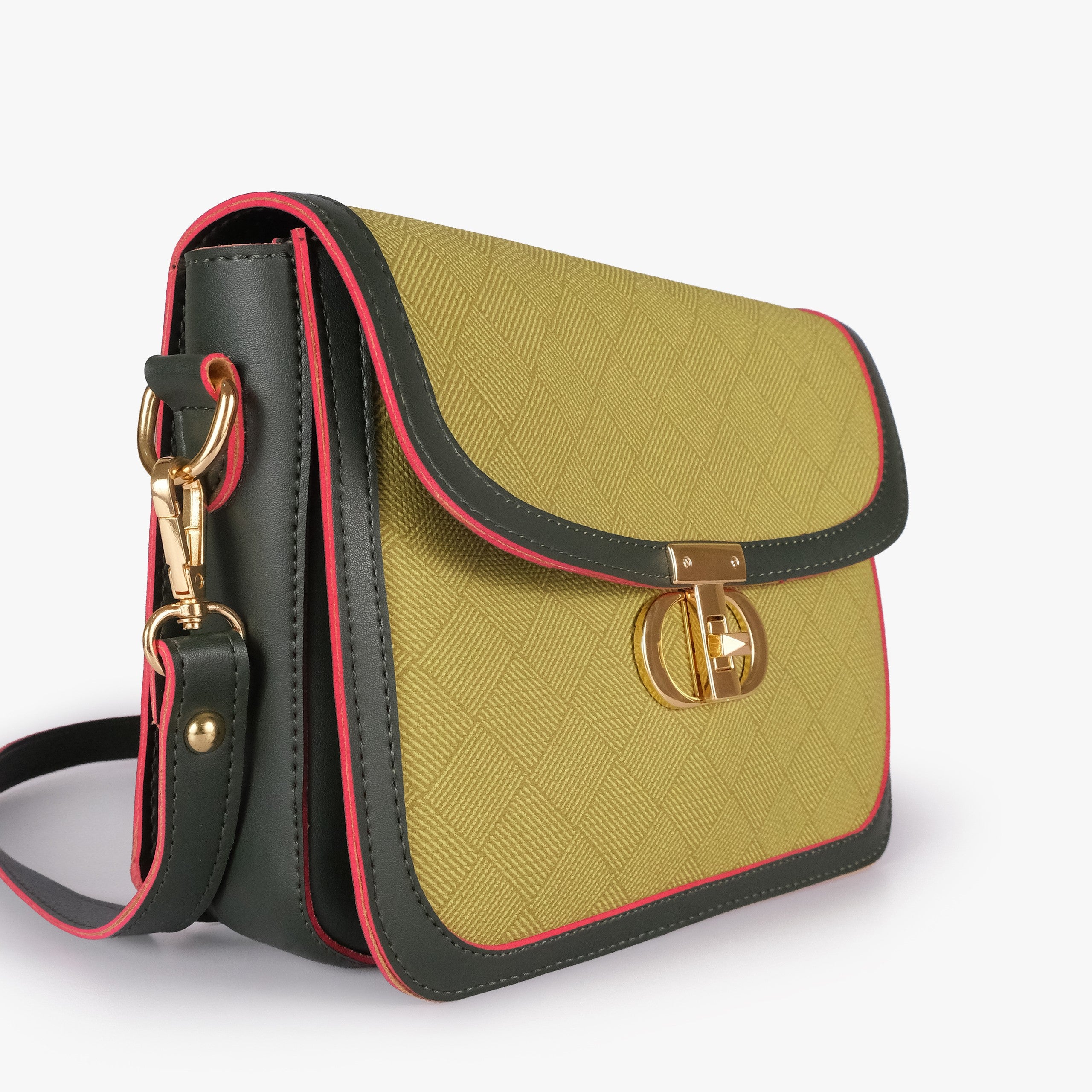Olive contrast cross-body bag — closeup of yellow-green crosshatch box-texture panel, dark forest-green pebbled trim, and gold twist-lock rockstud
