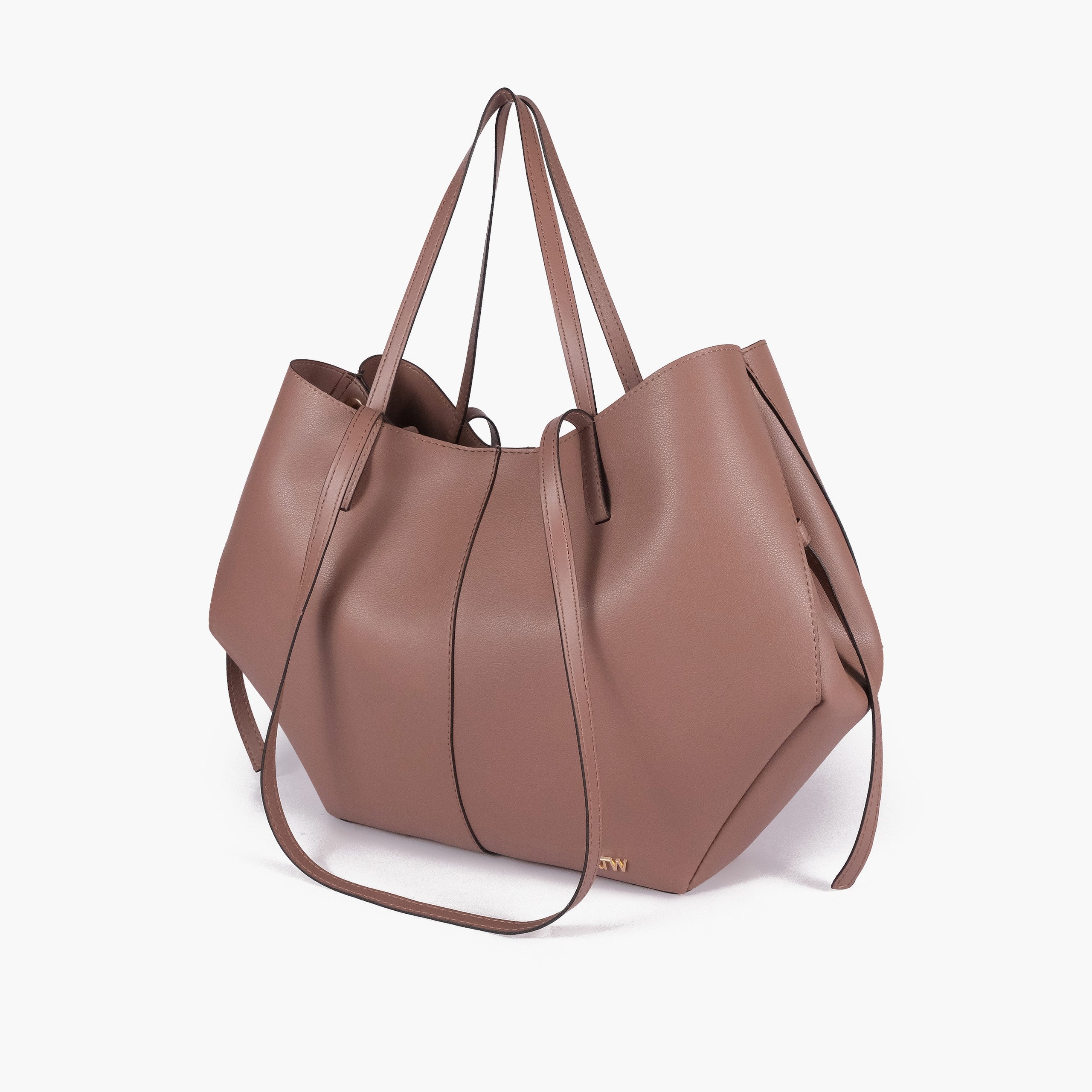 Brown atelier tote — hero 3/4 quarter view, warm sienna cognac-brown smooth faux leather, wing-cut origami sides, slim handles, gold RTW logo at front base