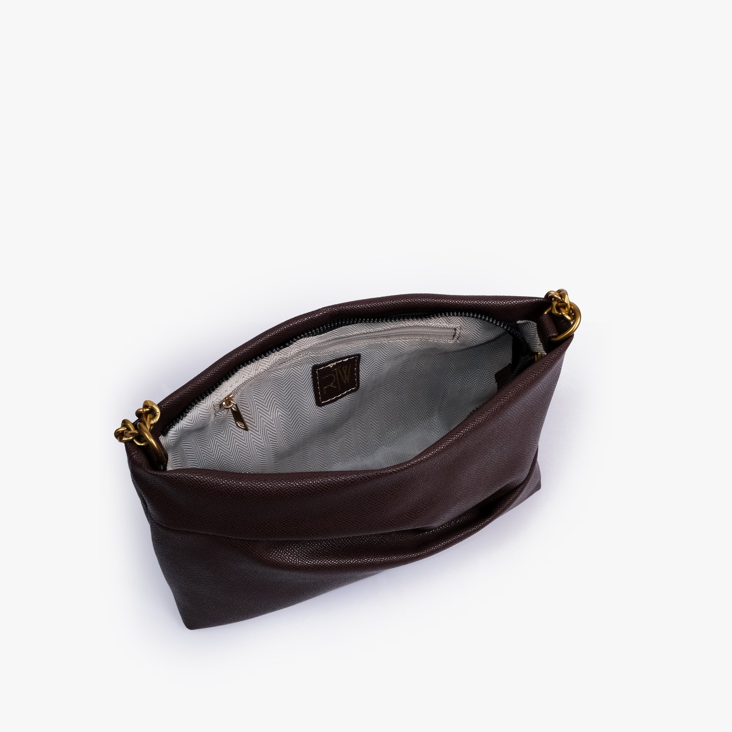 Dark brown pleated clutch bag with chain — open interior view showing the zipper closure, light lining, RTW label and interior zip pocket, deep espresso brown