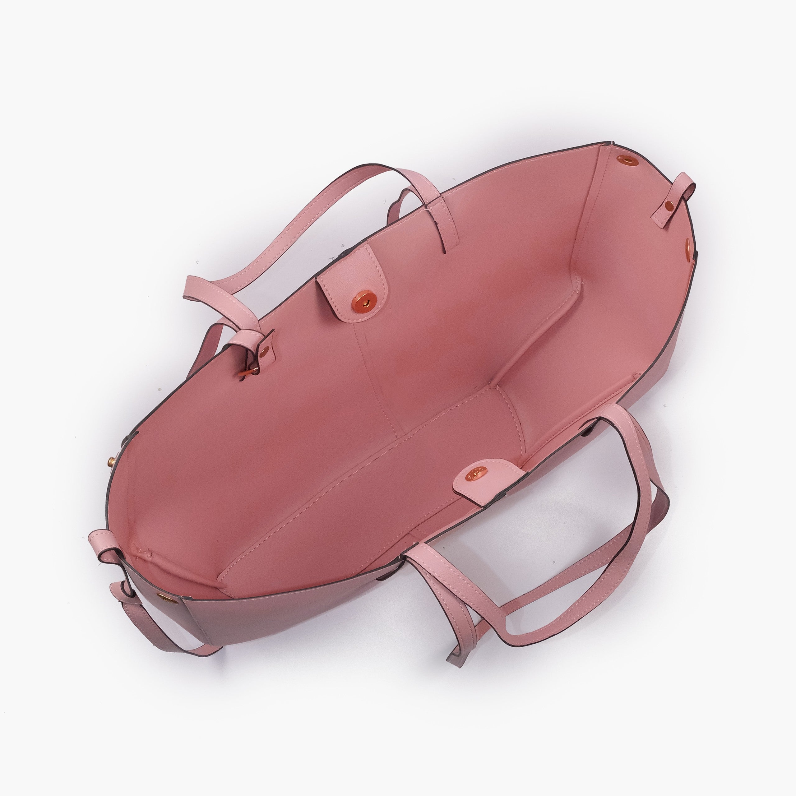 Pink atelier tote — interior top-down view with smooth dusty rose faux leather lining, center divider panel, gold magnetic snap