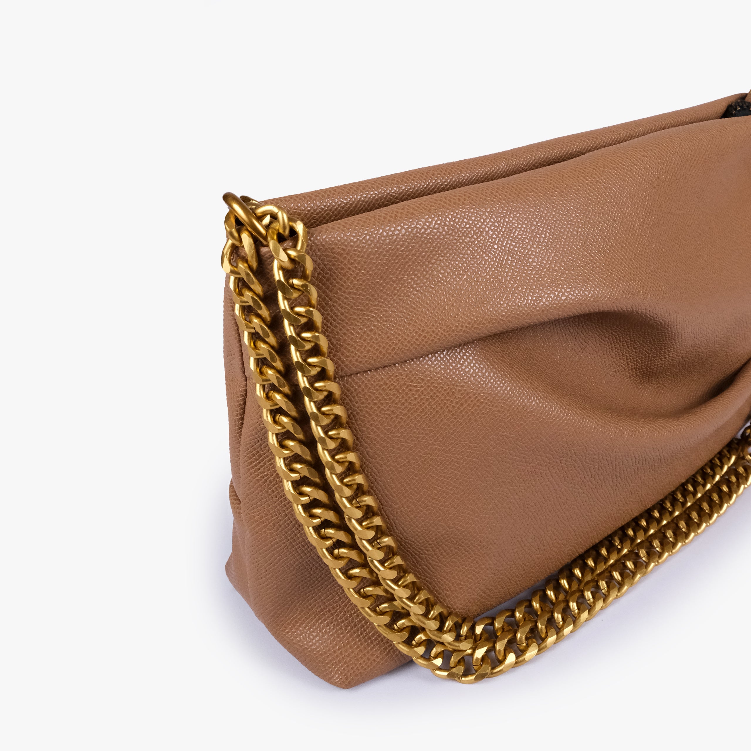 Coffee pleated clutch bag with chain — close detail showing the pleated faux-leather surface, chain links and top-corner hardware, muted coffee tan