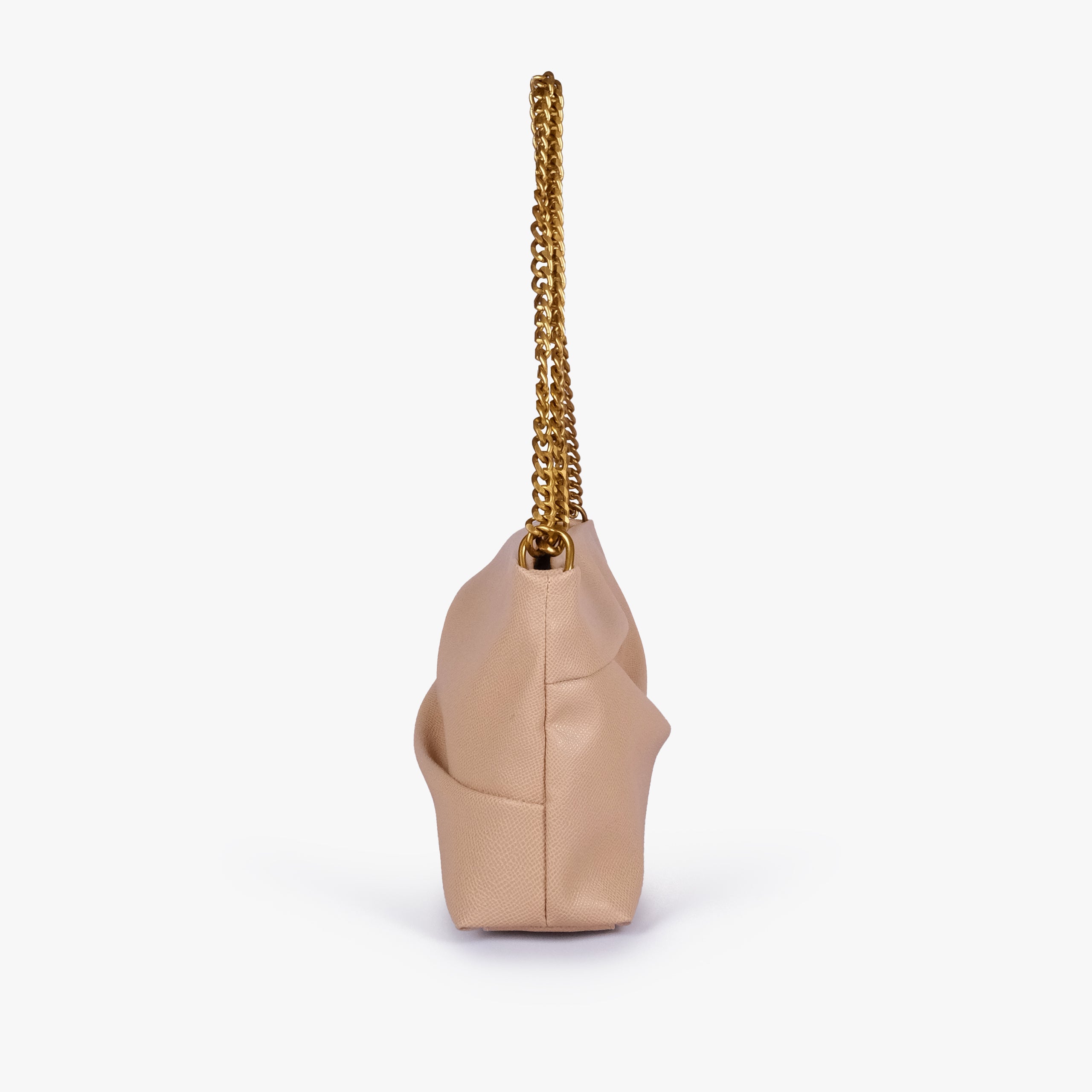 Beige pleated clutch bag with chain — side profile showing the narrow gusset, chain attachment and folded panel construction, warm pale beige