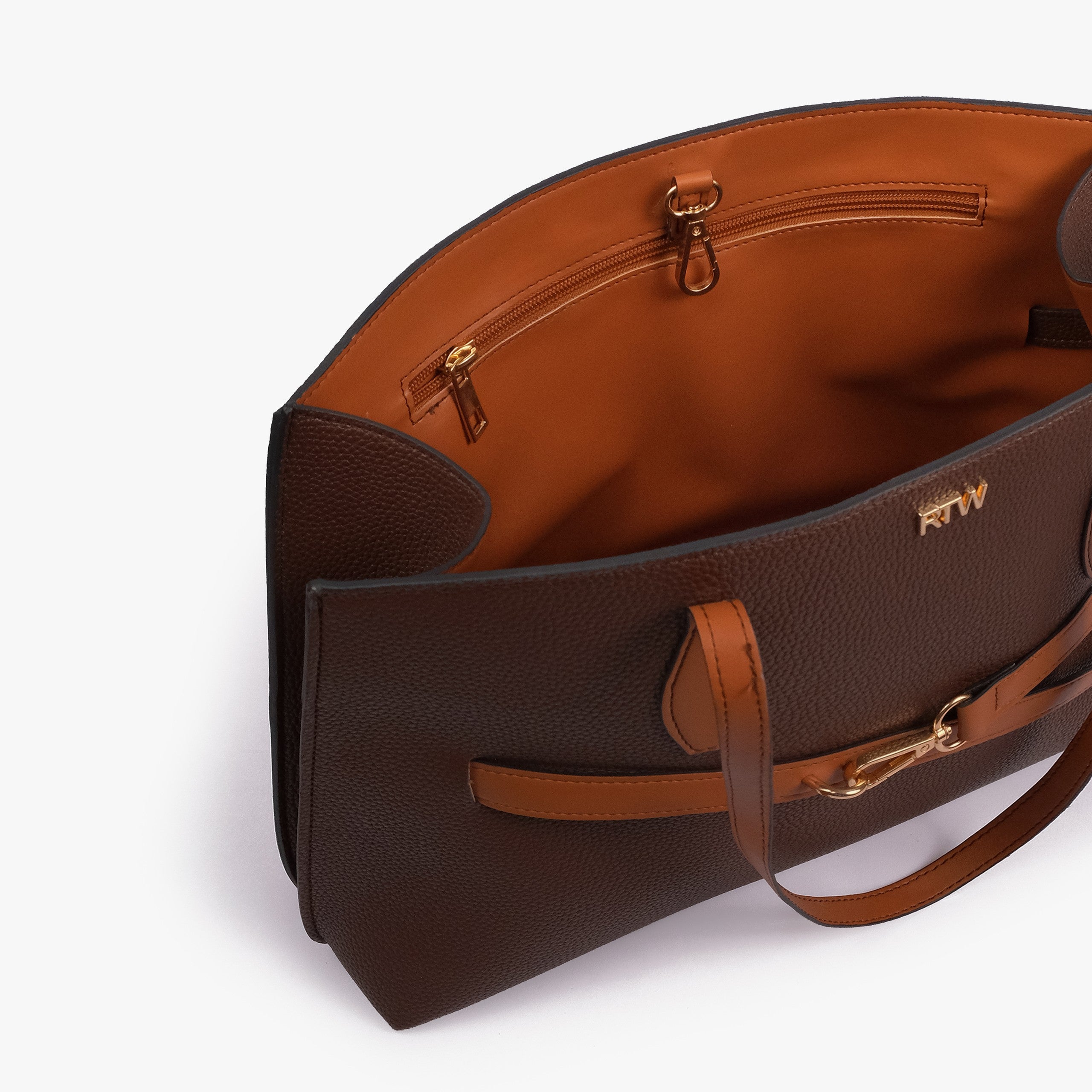 Dark brown Monday Tote — interior angled view showing back-wall zipped pocket, gold zipper, cognac lining, gold D-fittings