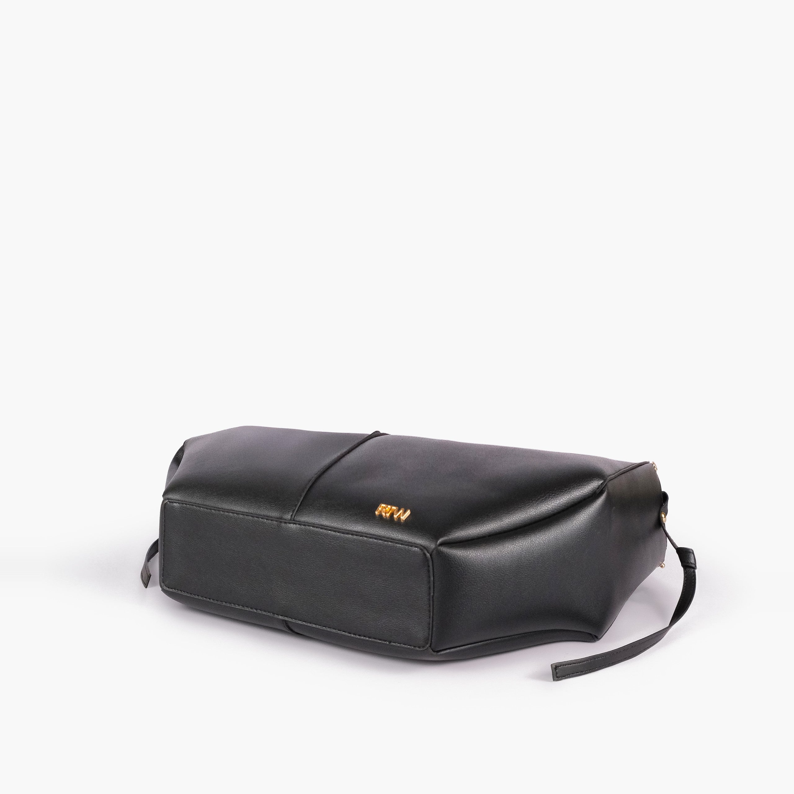 Black atelier tote — base angle showing reinforced flat base, gold RTW logo on front-bottom face, origami sides from below