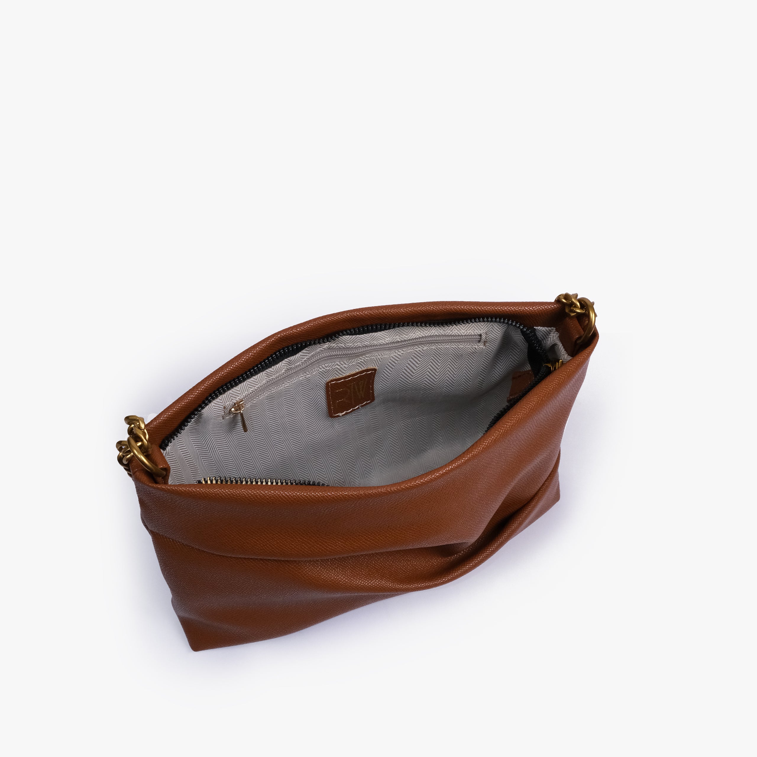 Horse brown pleated clutch bag with chain — open interior view showing the zipper closure, light lining, RTW label and interior zip pocket, warm cognac brown