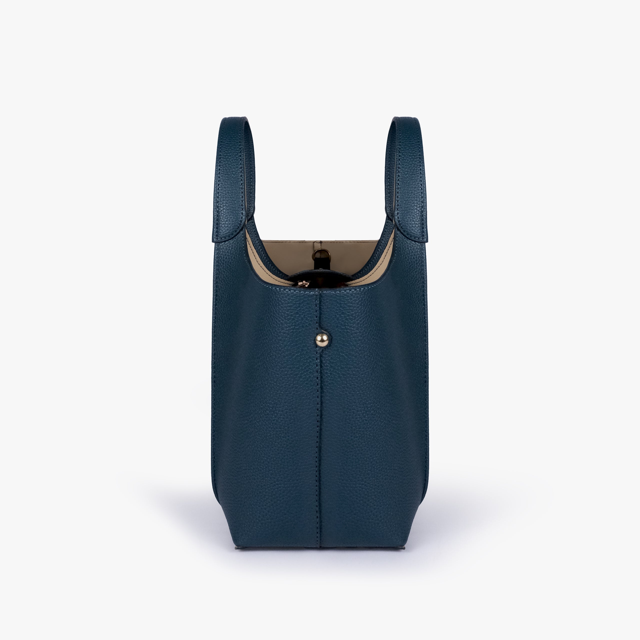 Side profile of Teal scoop mini tote bag