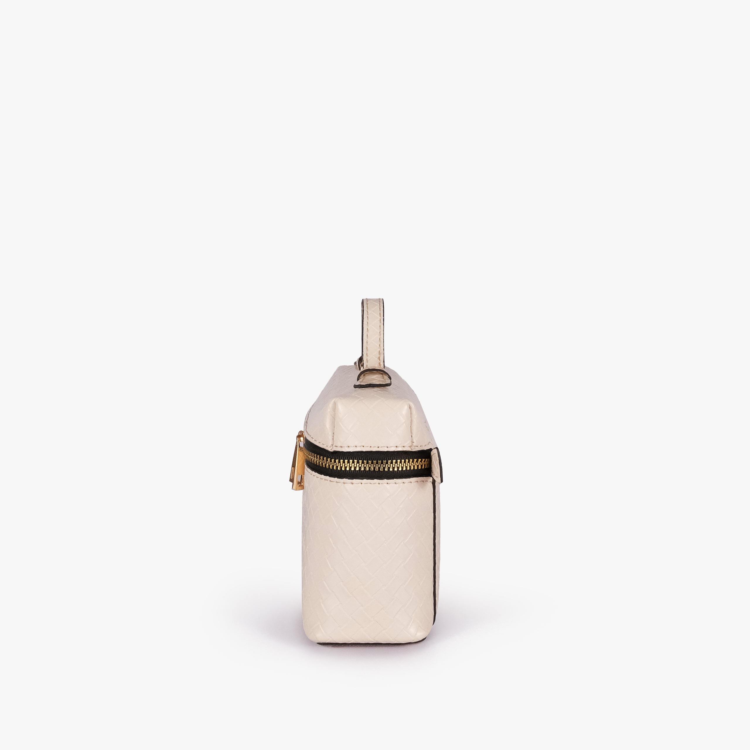 Cream weave vanity top-handle bag — side profile showing the structured depth, wraparound zipper band near the top, side attachment tab, and long strap