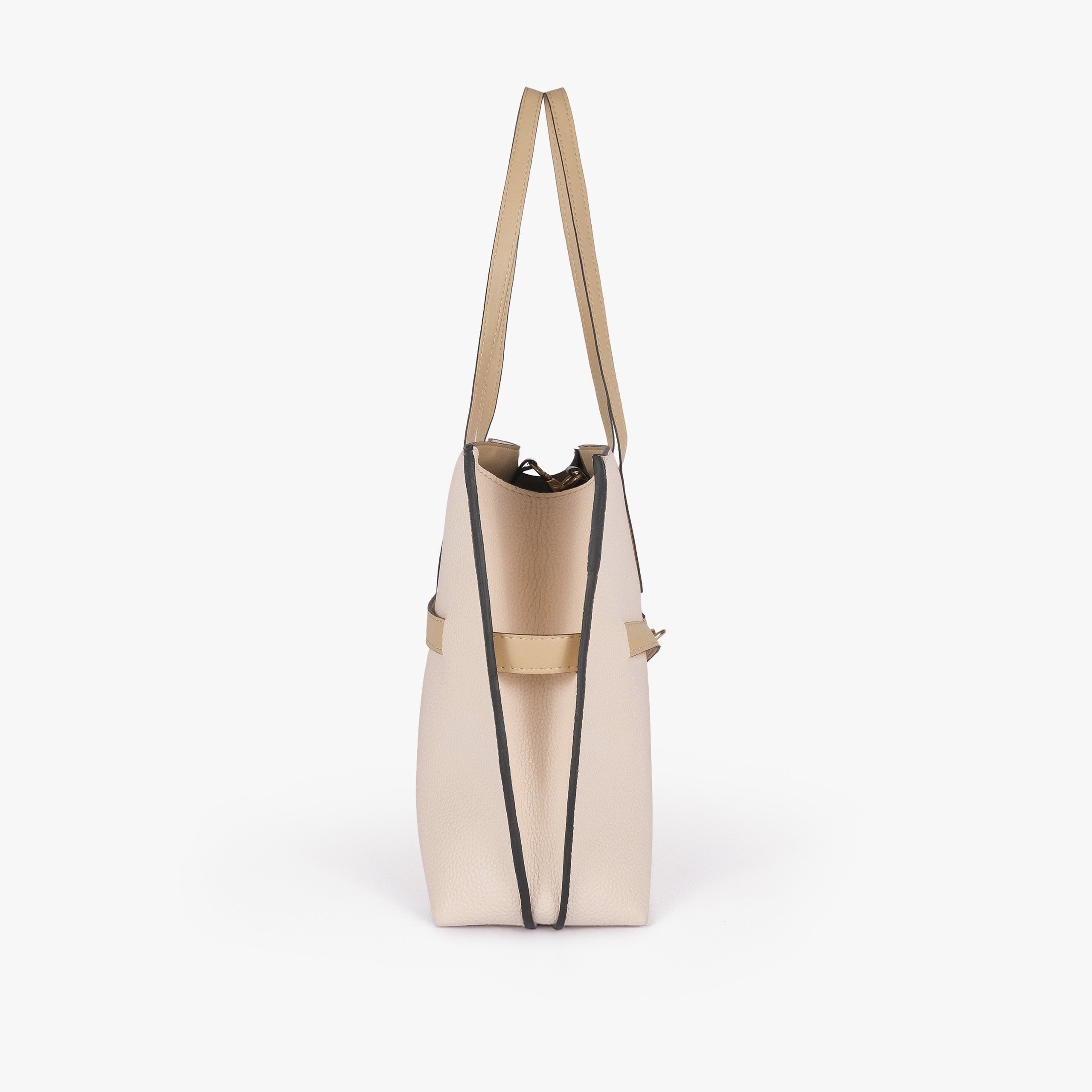Off-white cream Monday Tote — side profile showing slim gusset and wing-cut origami corner fold with tan accent edging
