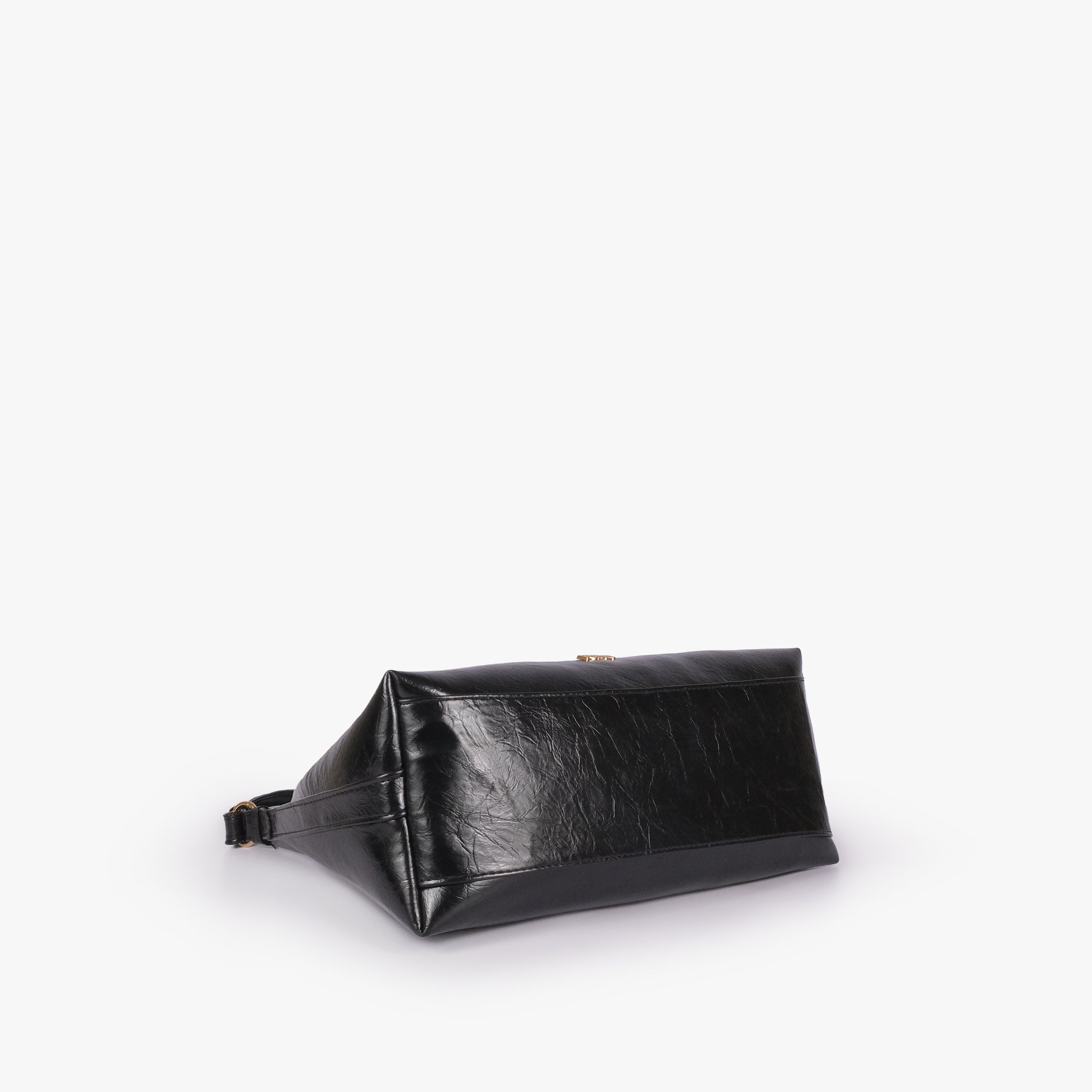 Black crinkle crescent hobo — base view showing the matching faux-leather bottom and softly structured shape