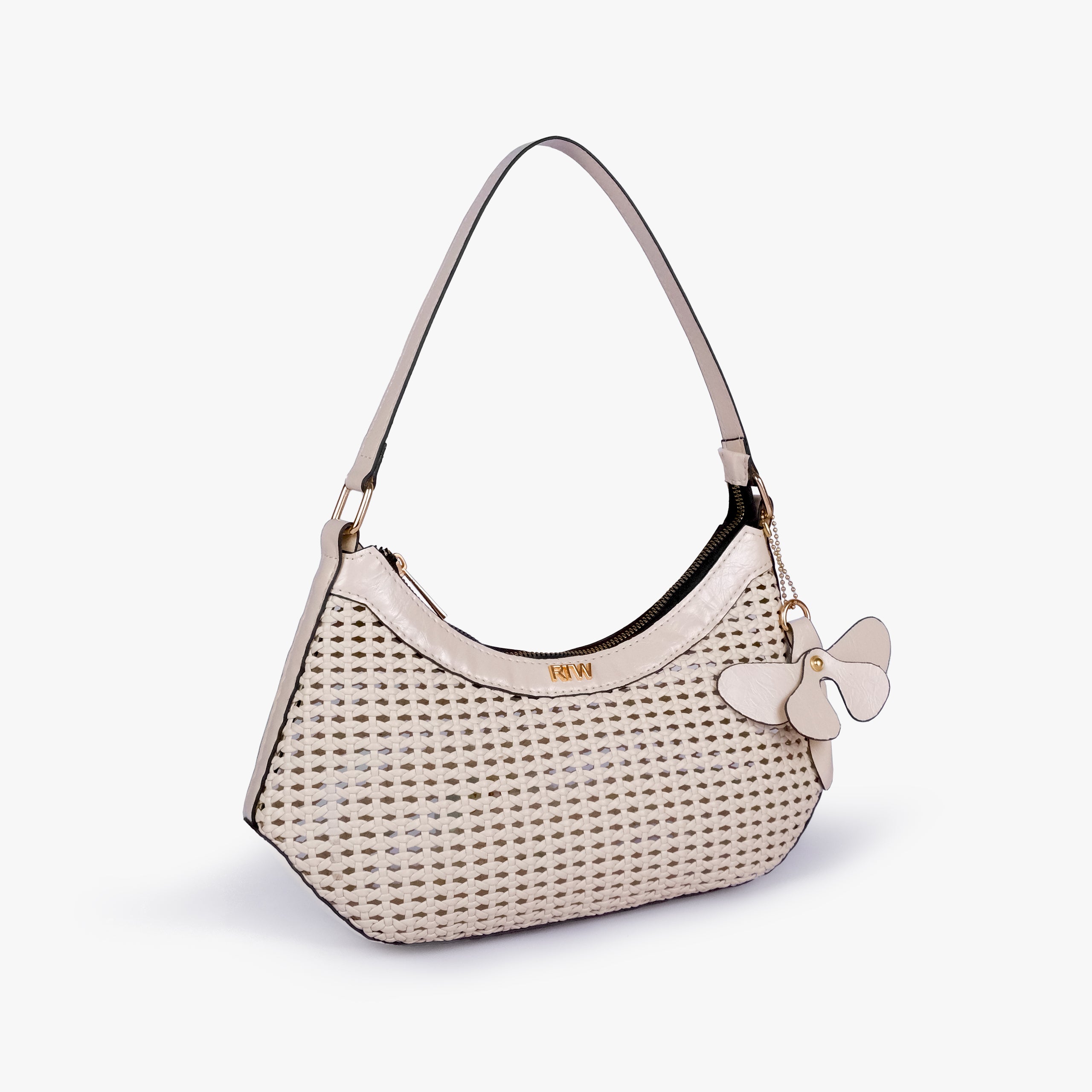 Ivory woven shoulder bag in three-quarter view