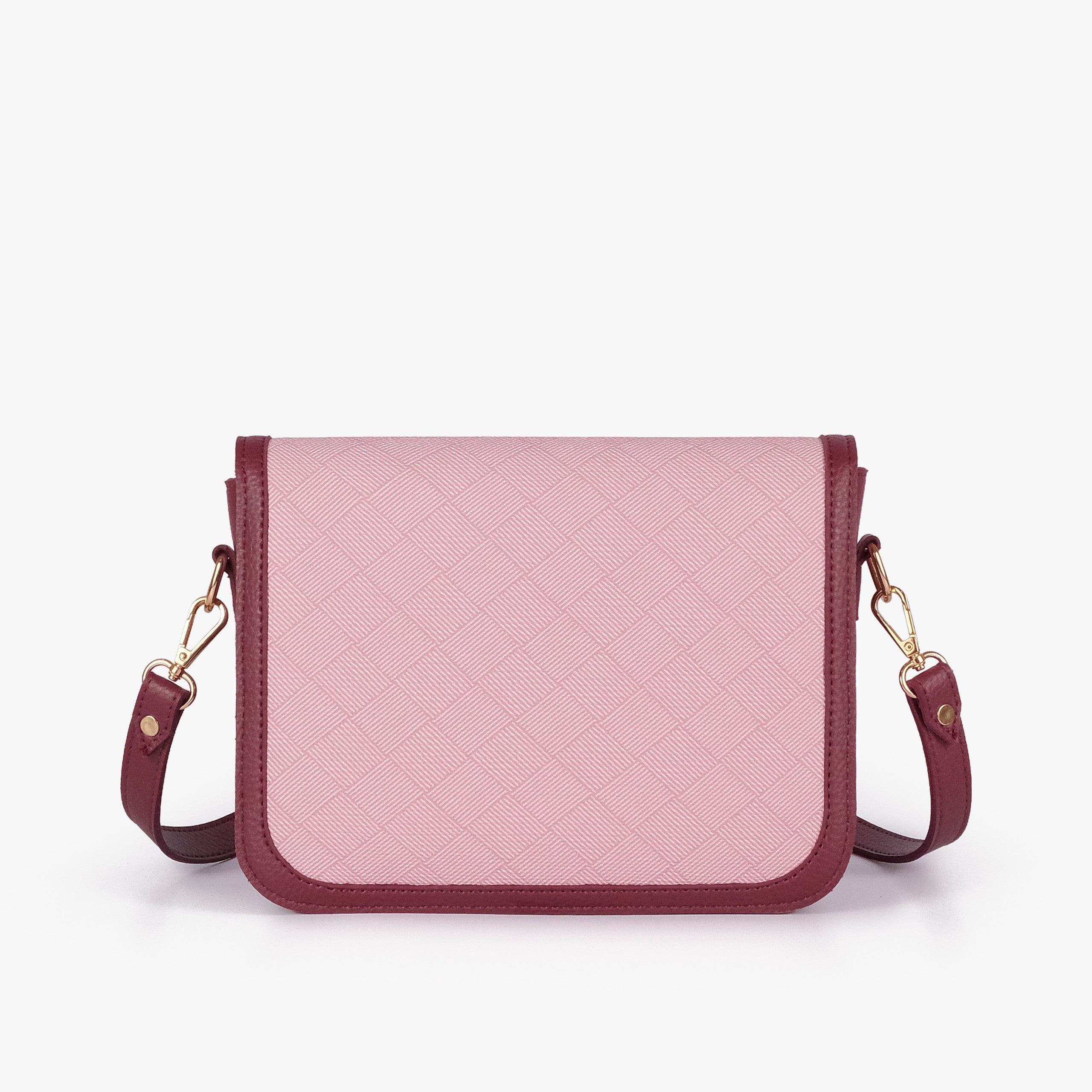 Pink contrast cross-body bag — back view showing pink box-texture panel framed by deep burgundy pebbled trim