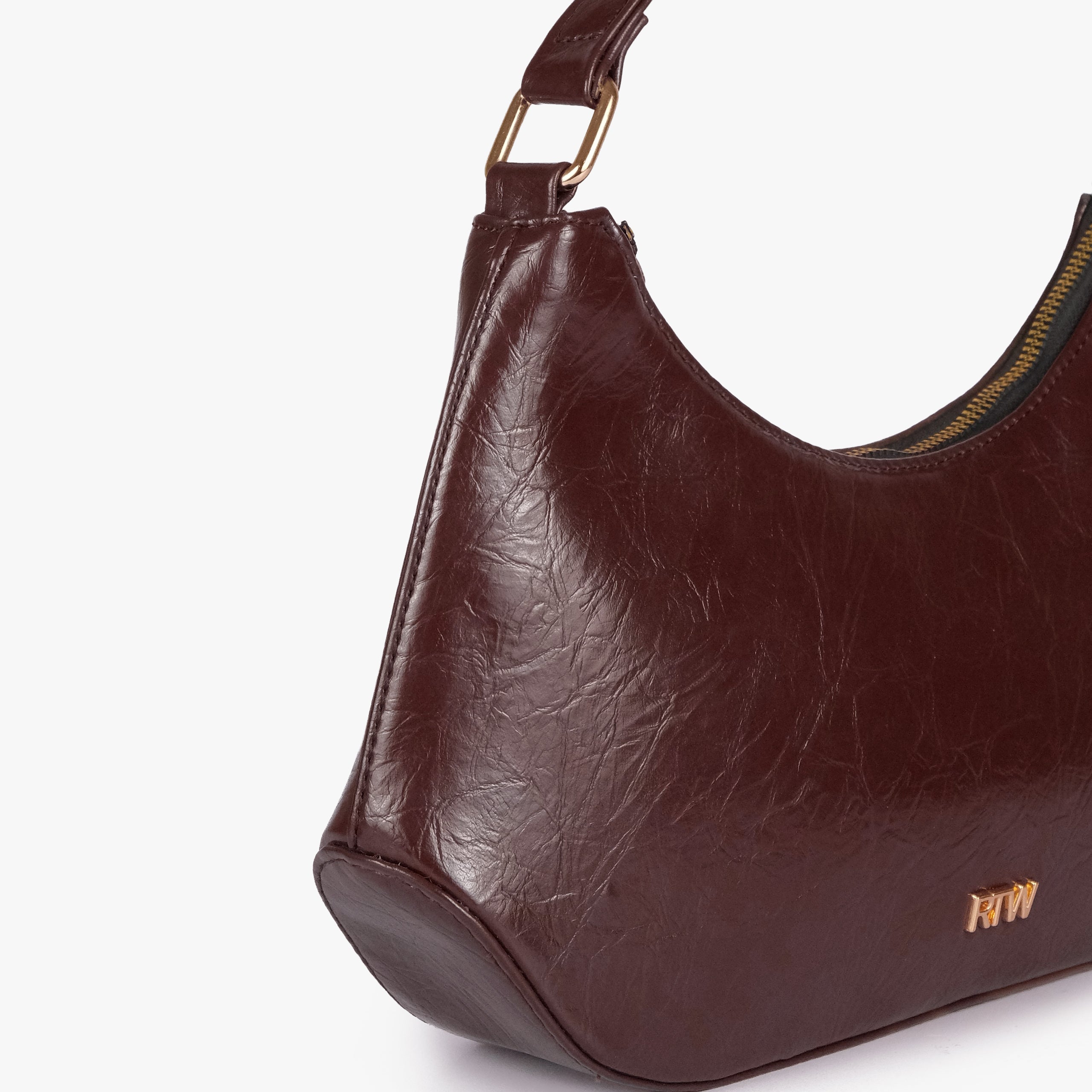 Dark brown crinkle shoulder bag — closeup showing the crinkled faux-leather texture and crinkled texture, zip-top detail, and minimal gold-tone detail