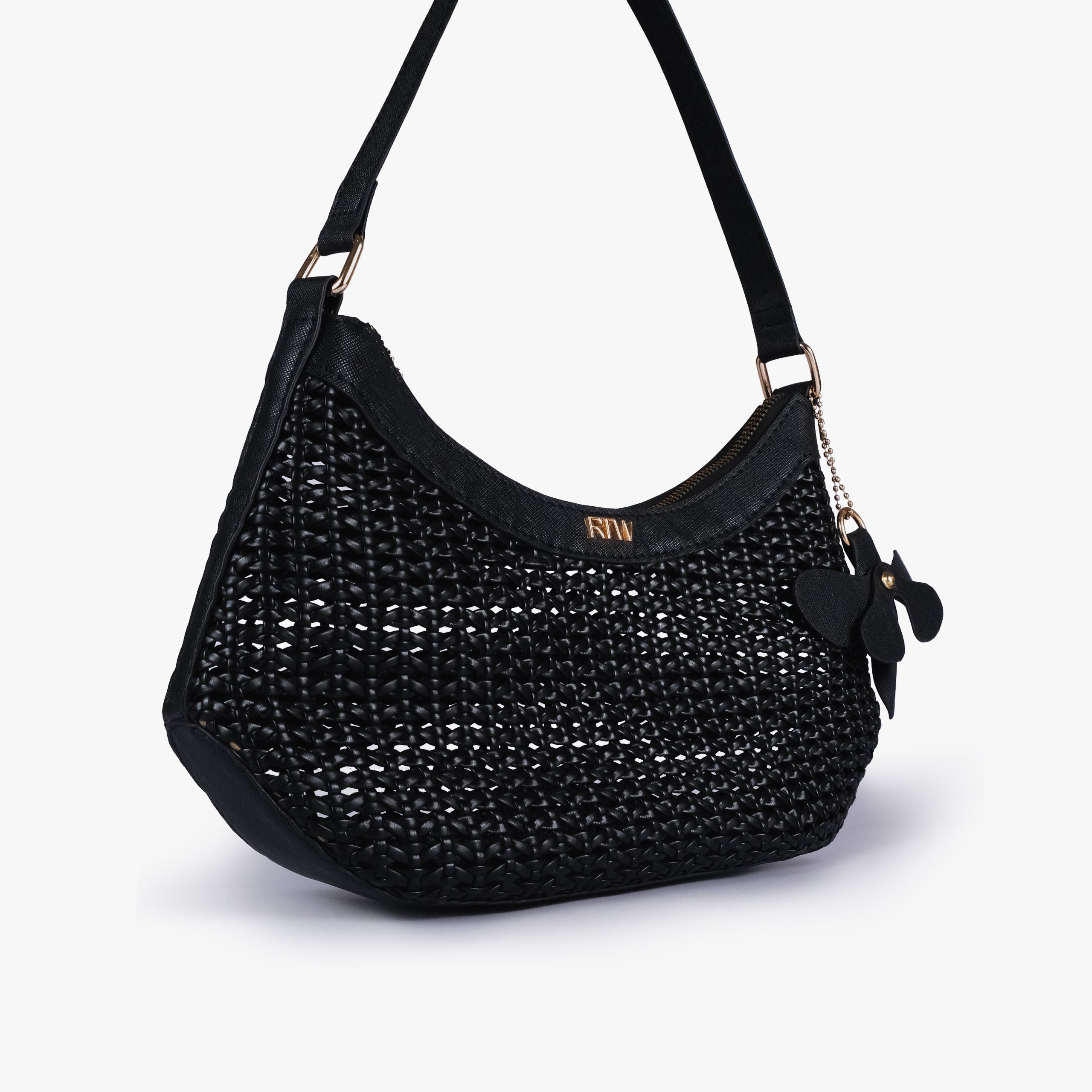 Black woven shoulder bag in angled hero view