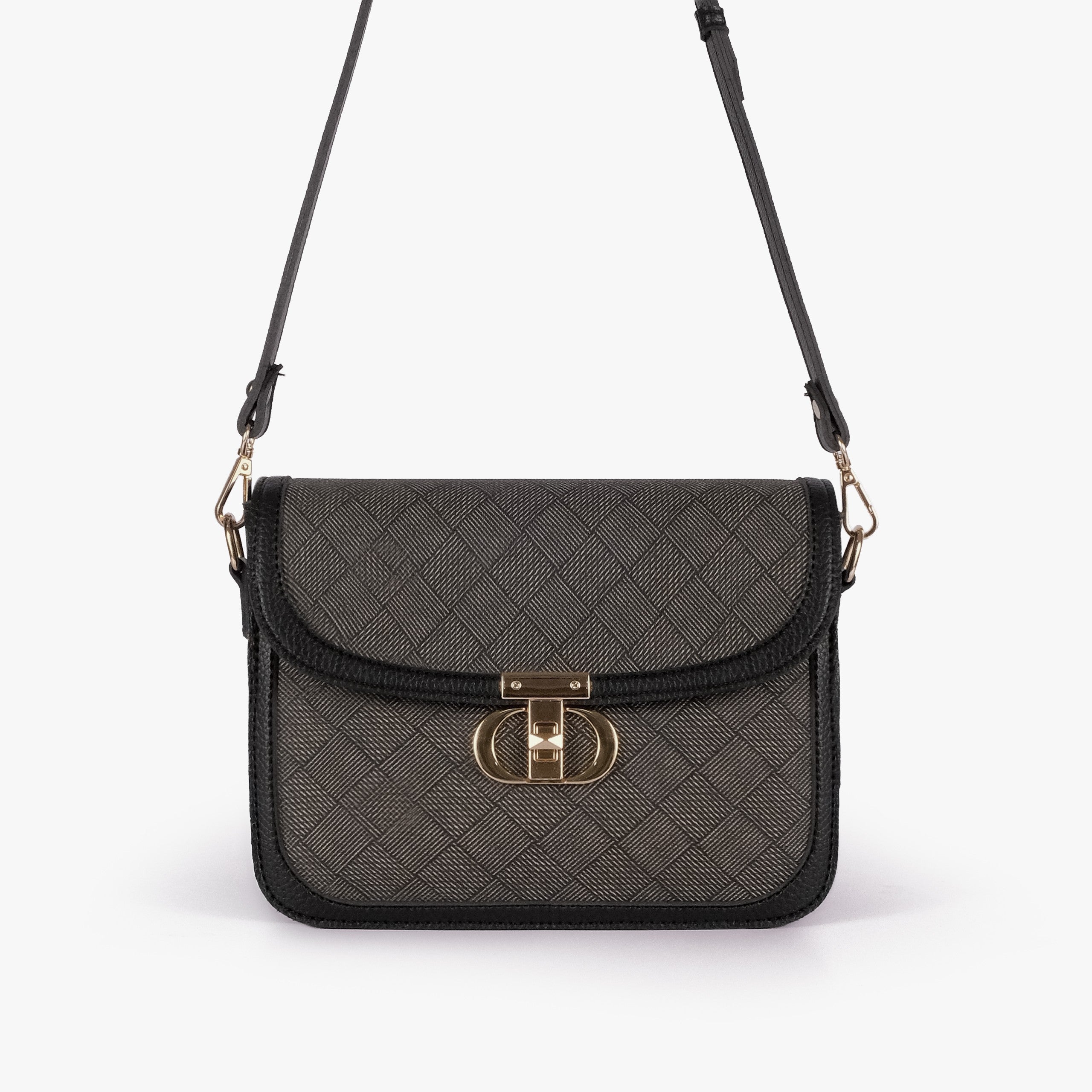 Charcoal contrast cross-body bag — front view with strap extending overhead, cross-body wear position