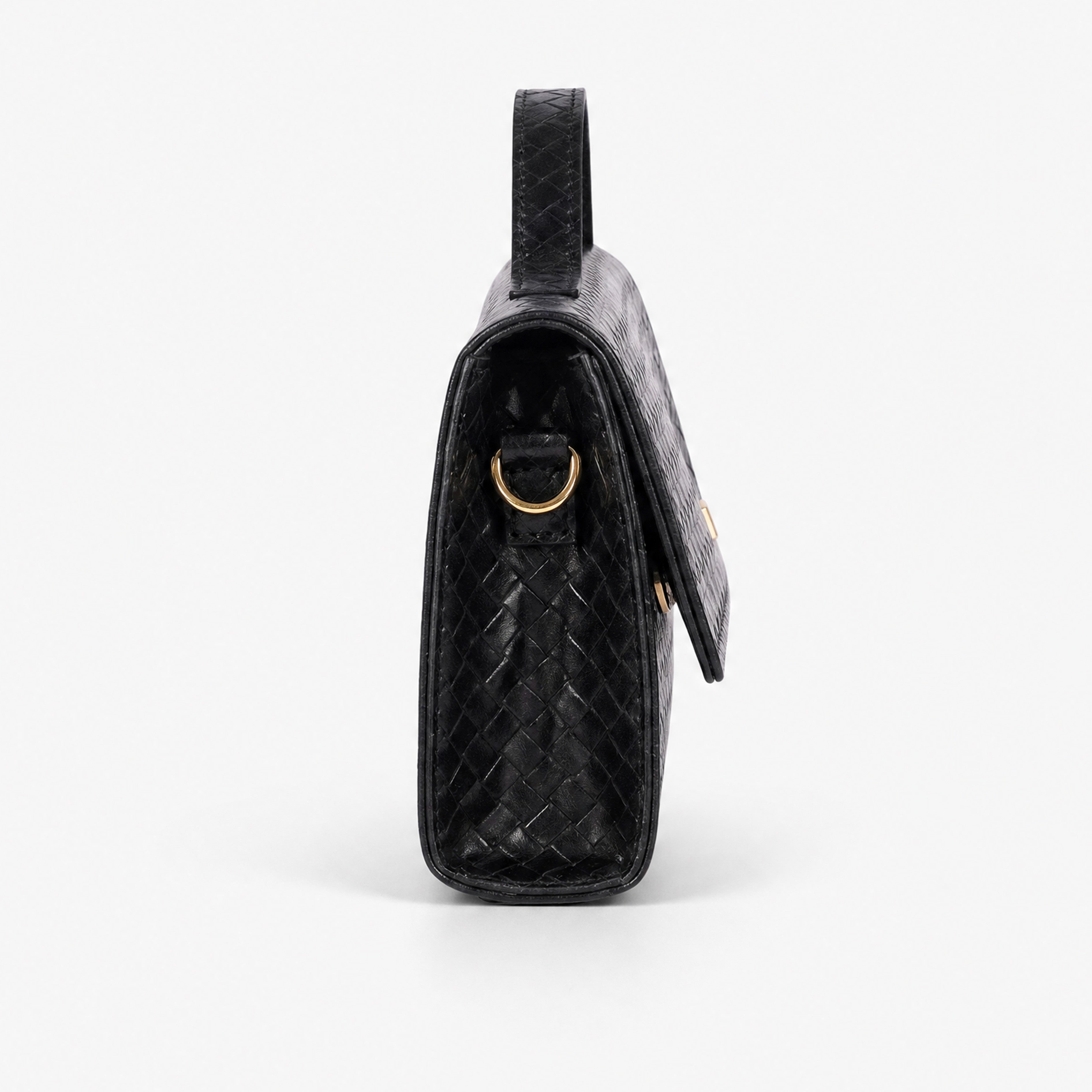 Woven black weave clutch — side profile showing gold D-ring chain attachment, gusset depth, and top handle base