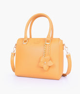 Mustard handbag with flower charm