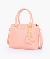 Peach handbag with flower charm
