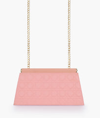 Peach quilted evening clutch with snap closure