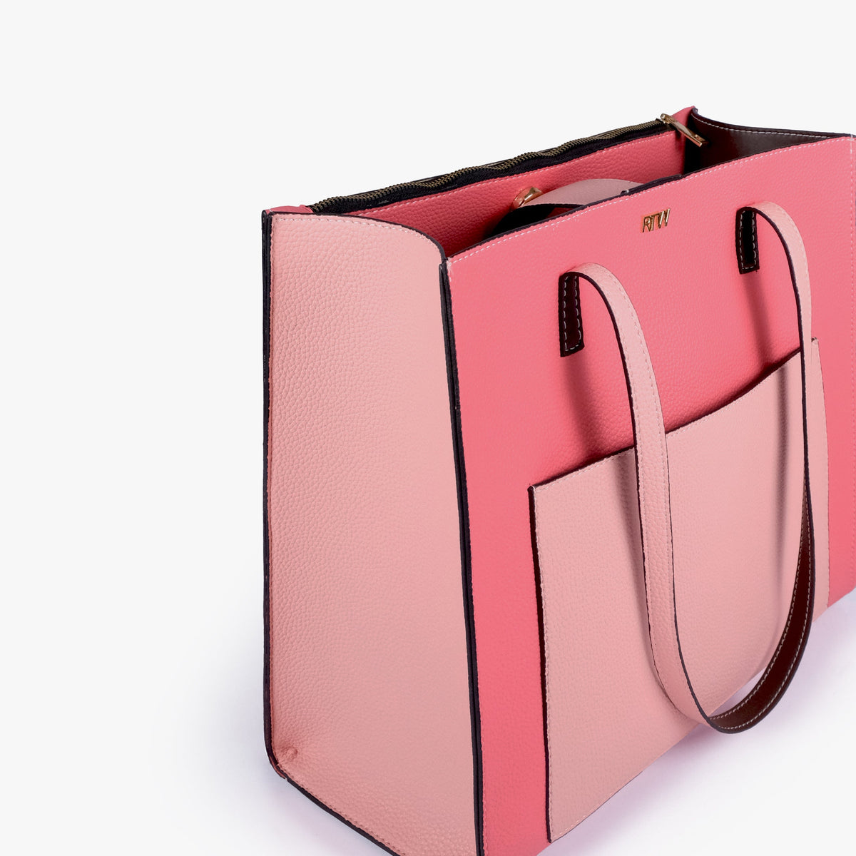 Close-up of Petal color blocking tote showing the color-block panels and handles