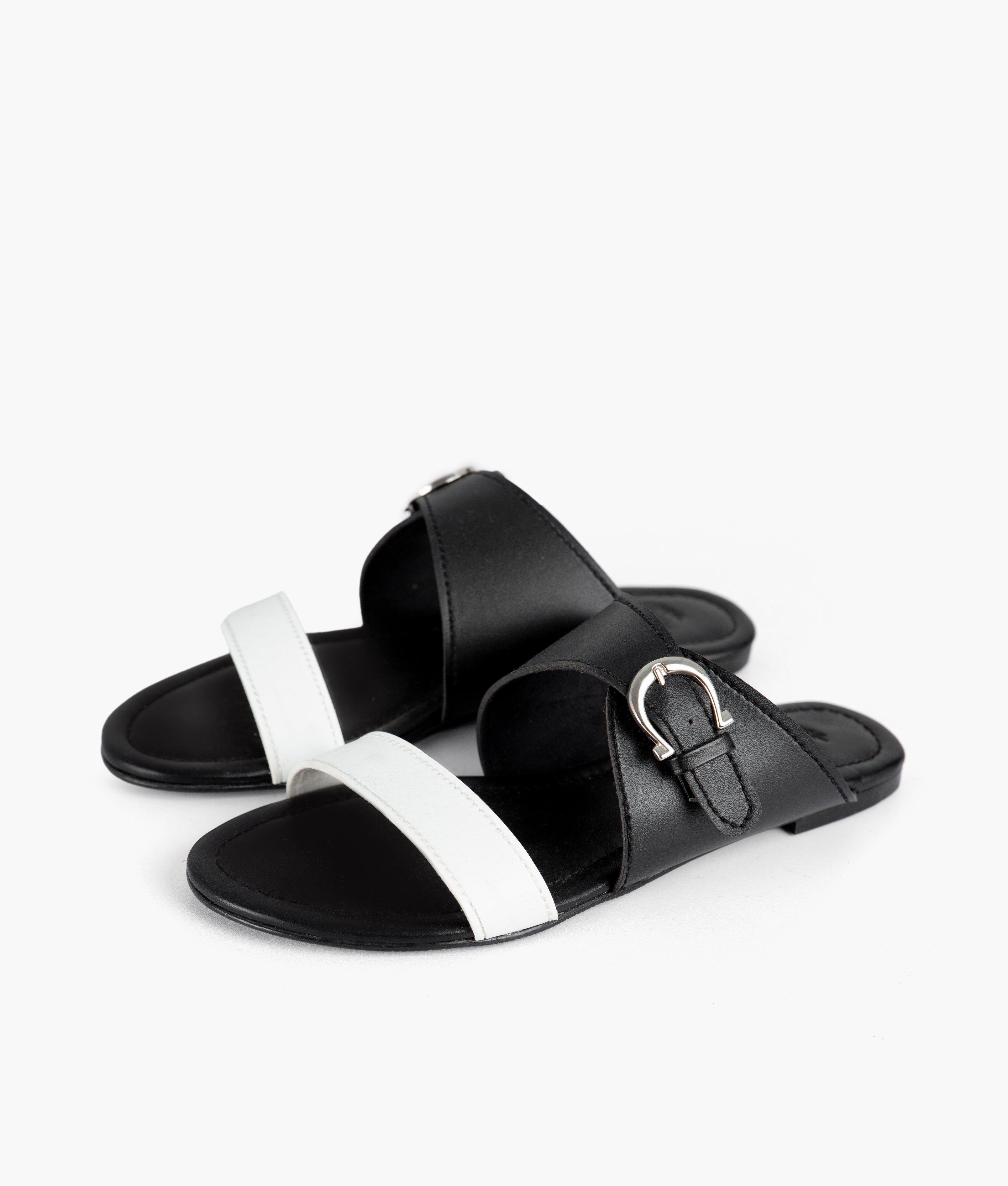 White and black buckle-up flats