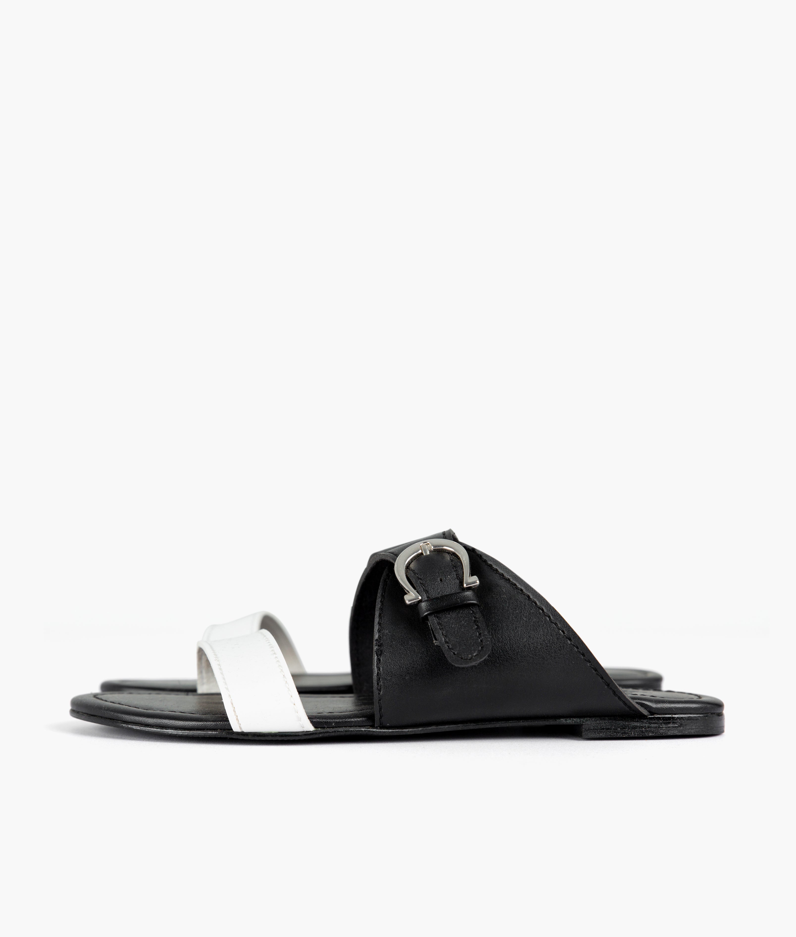 White and black buckle-up flats