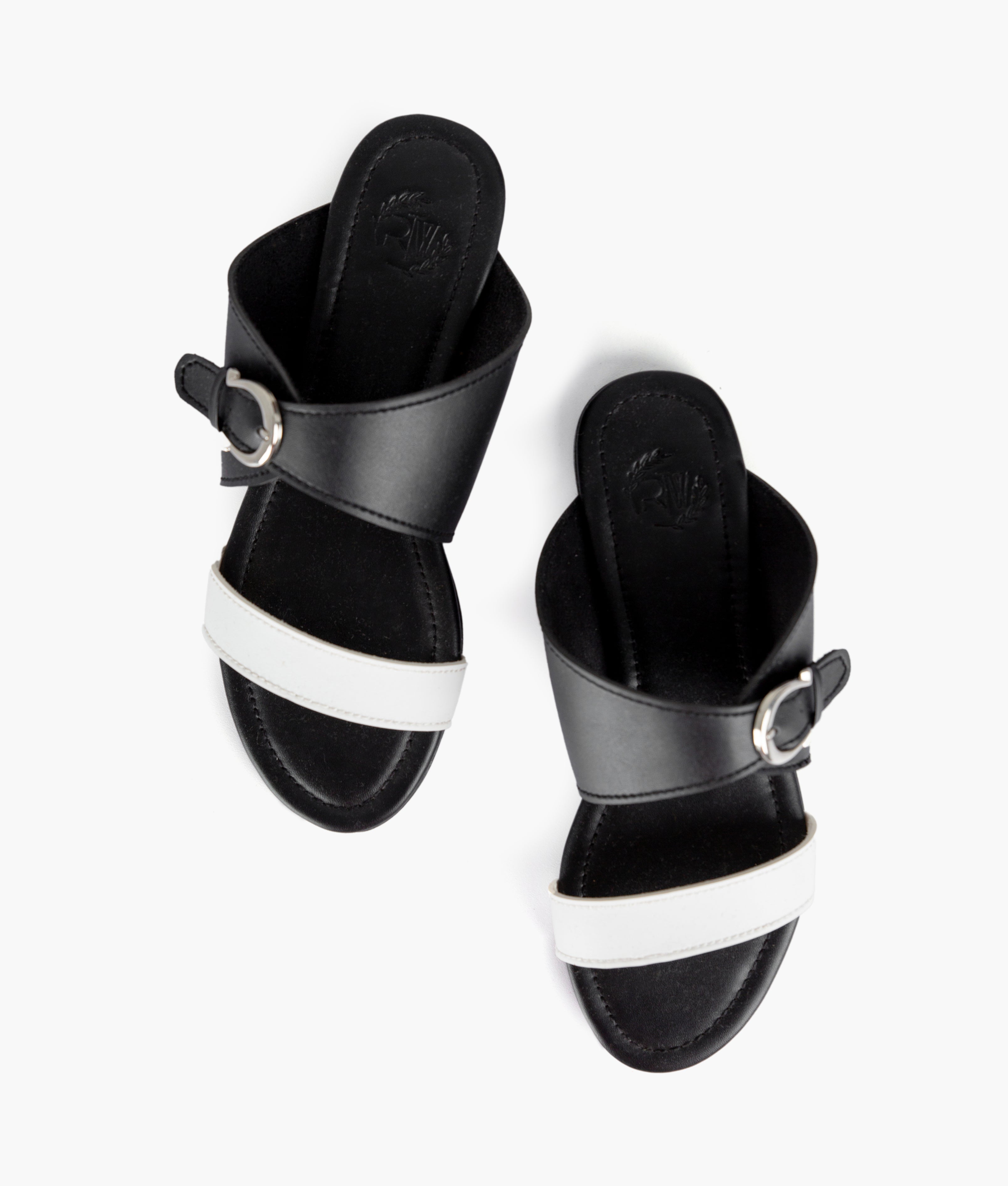 White and black buckle-up flats
