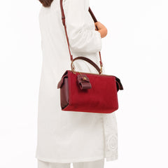 Burgundy suede bowling bag with top-handle