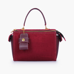 Burgundy suede bowling bag with top-handle