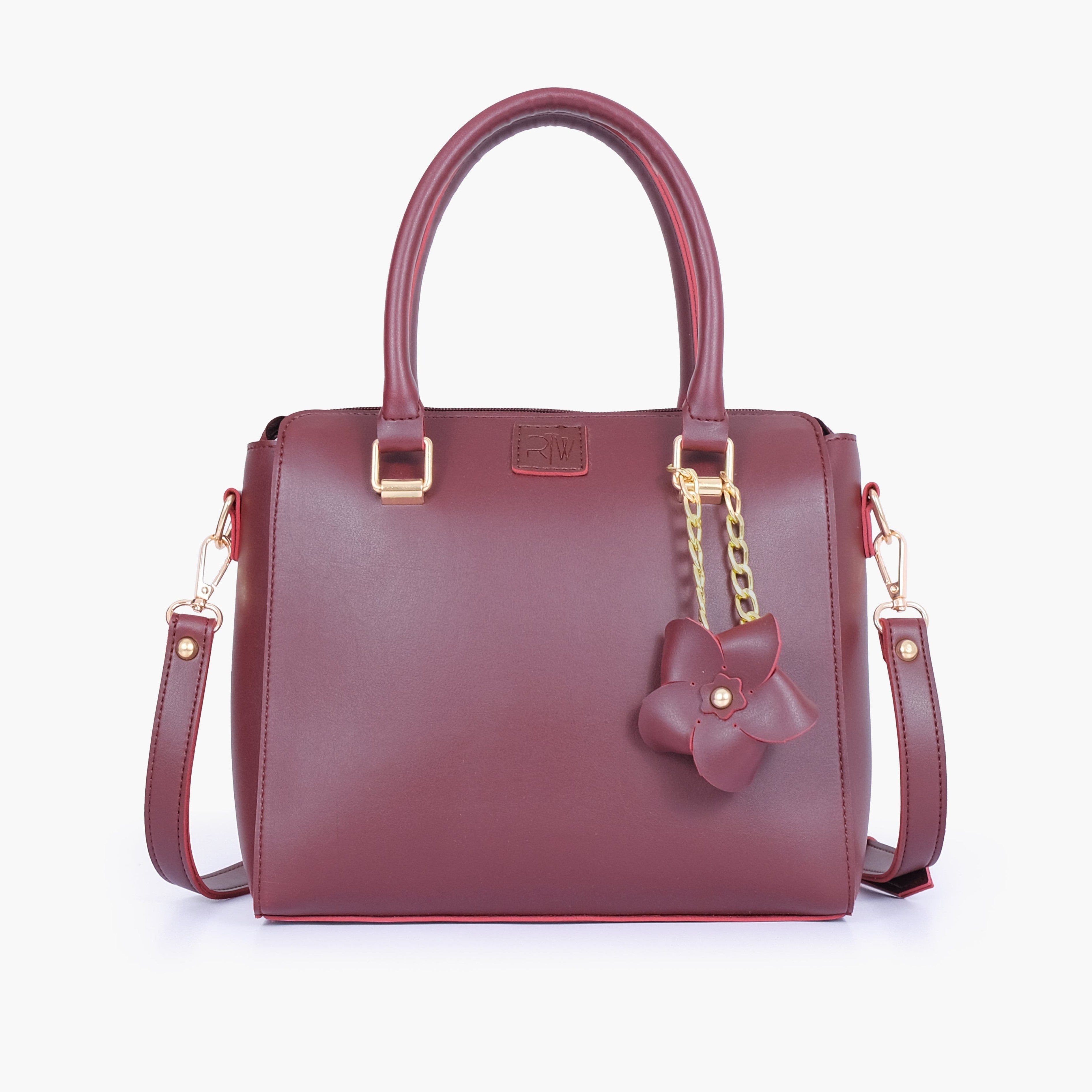 Burgundy handbag with flower charm