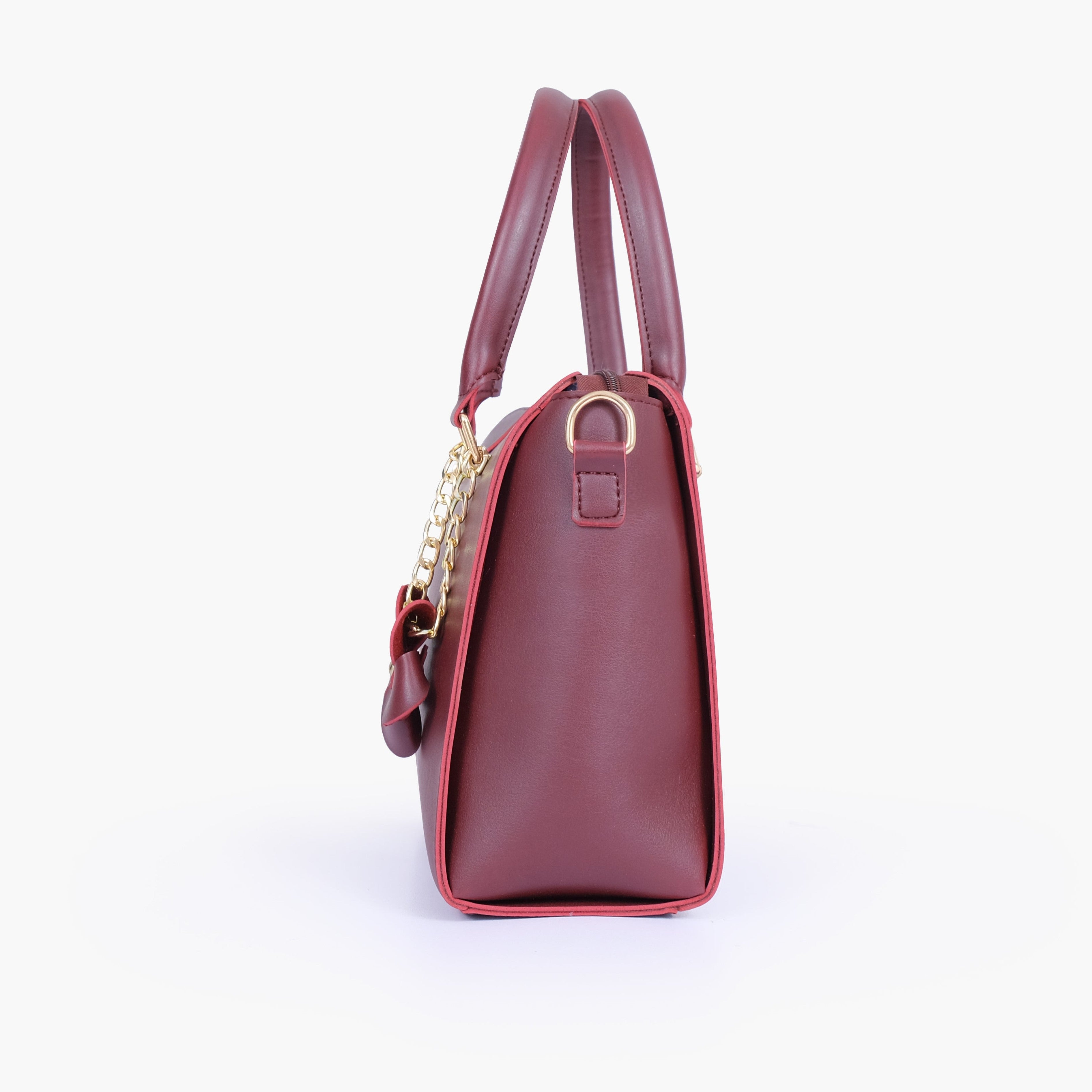 Burgundy handbag with flower charm