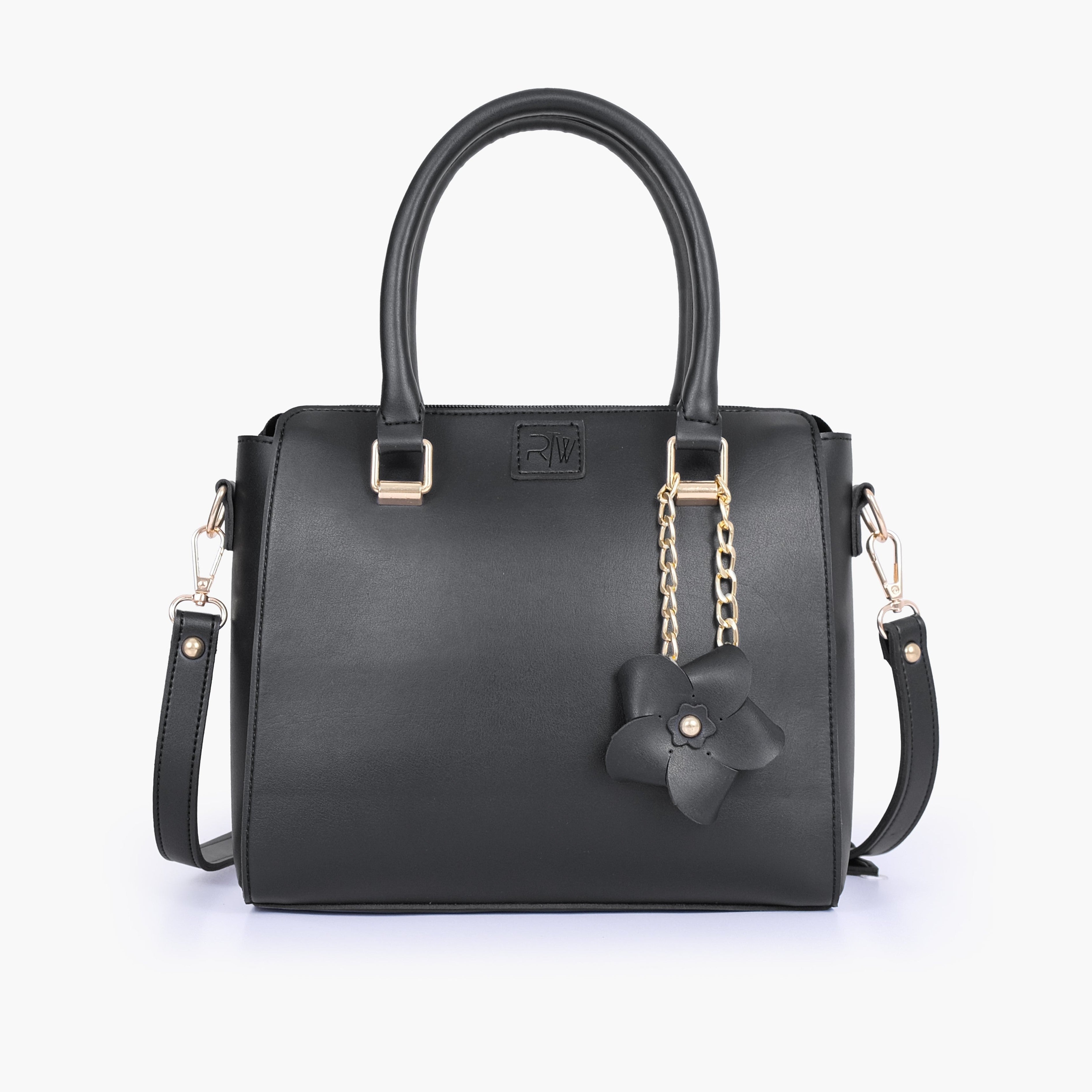 Black handbag with flower charm