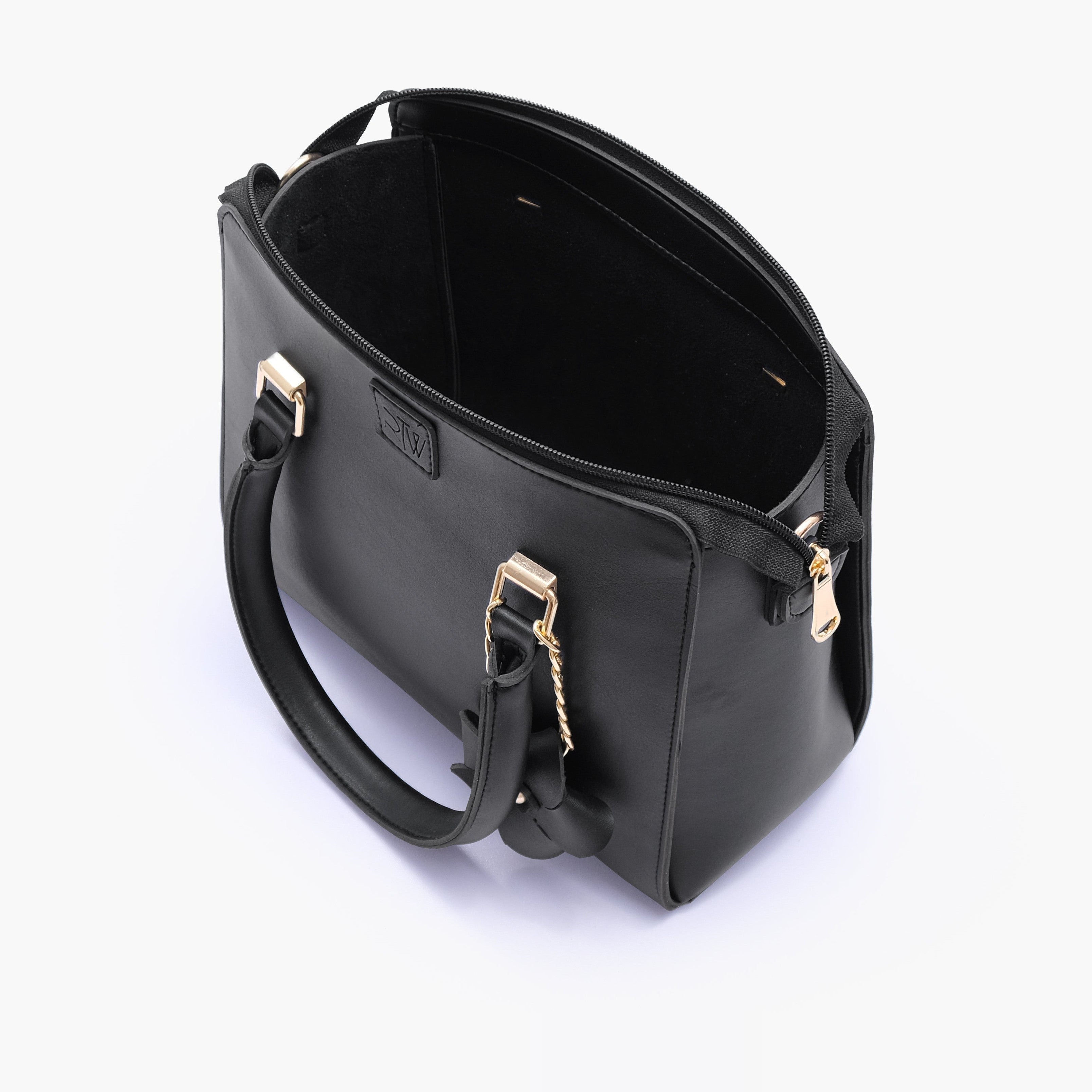 Black handbag with flower charm