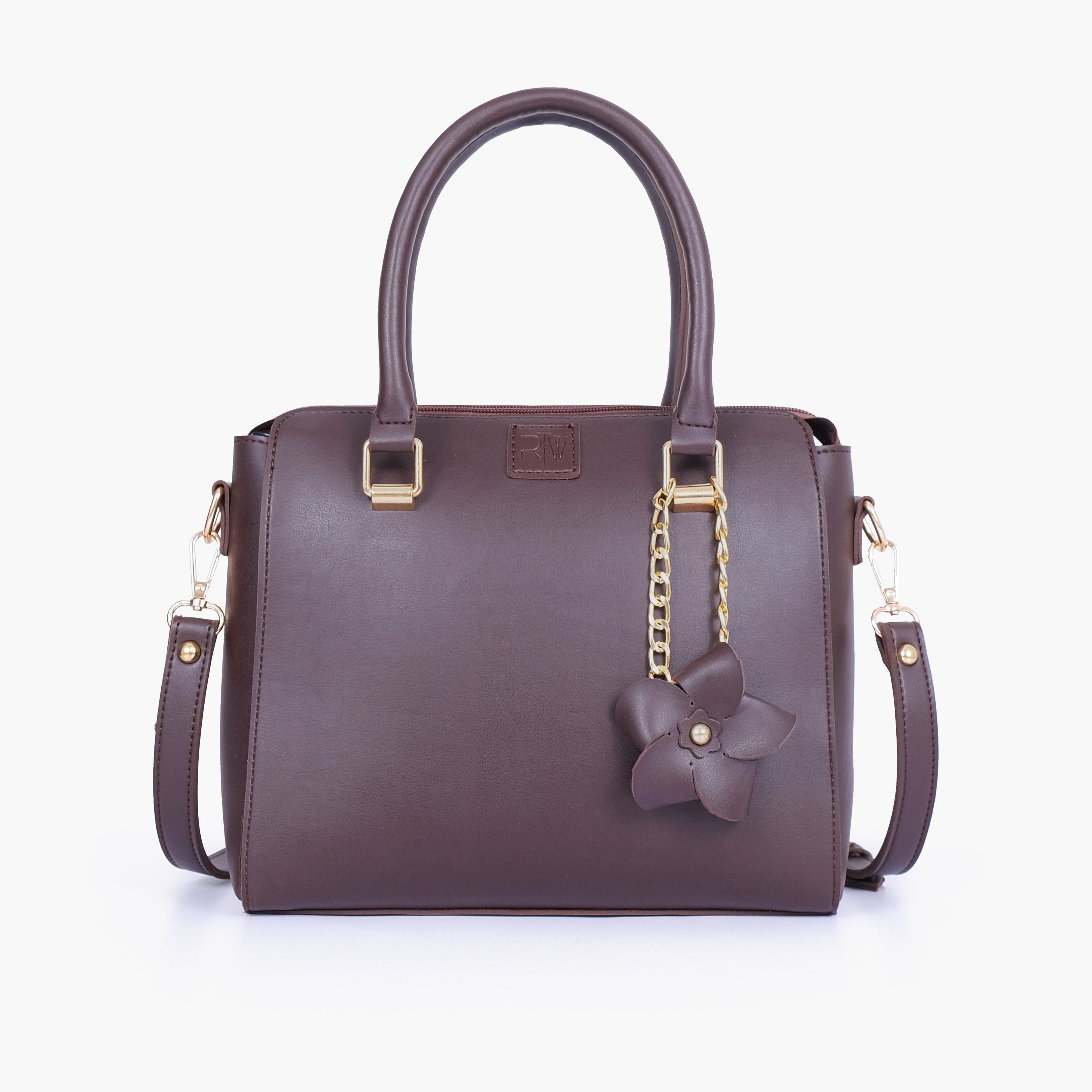 Dark brown handbag with flower charm