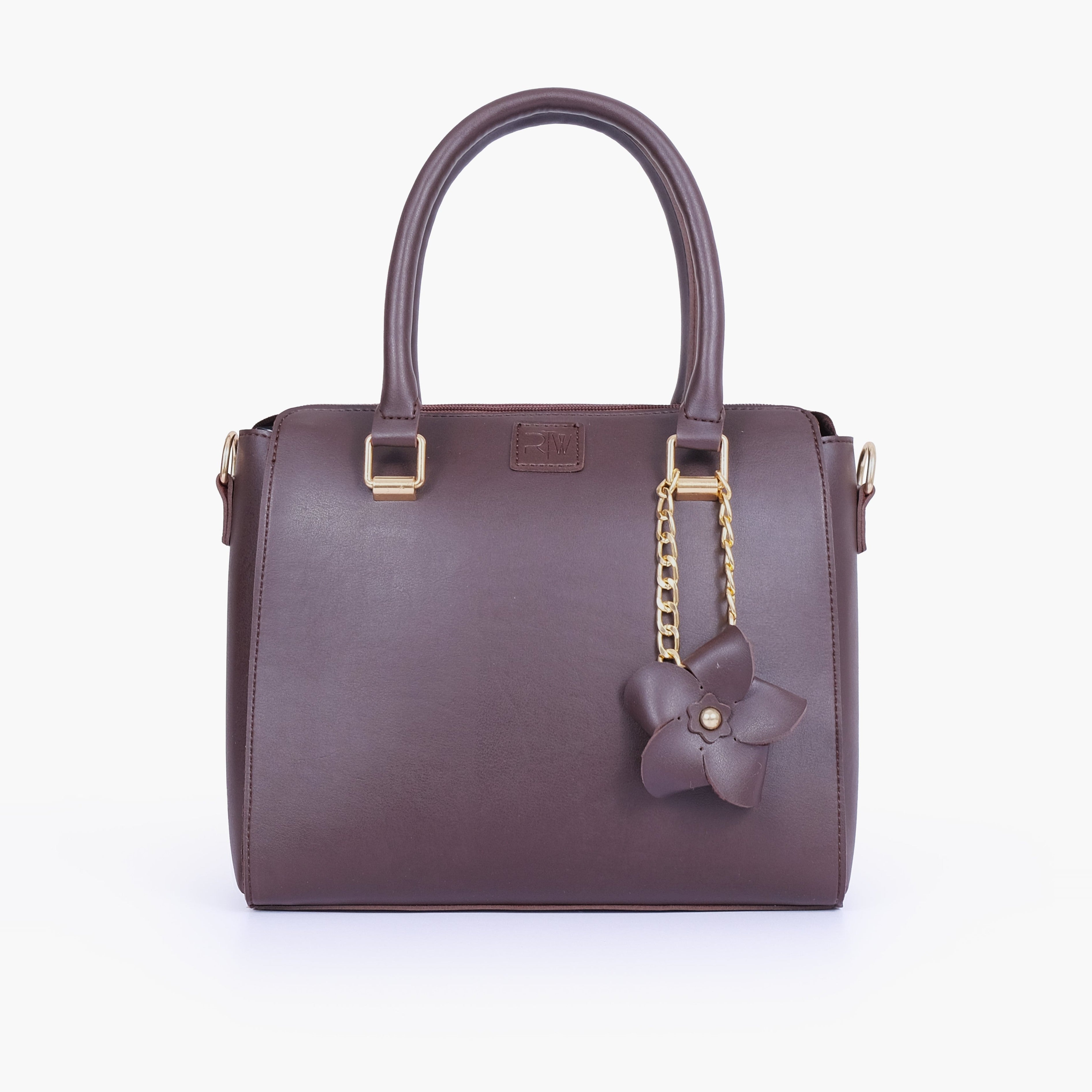 Dark brown handbag with flower charm