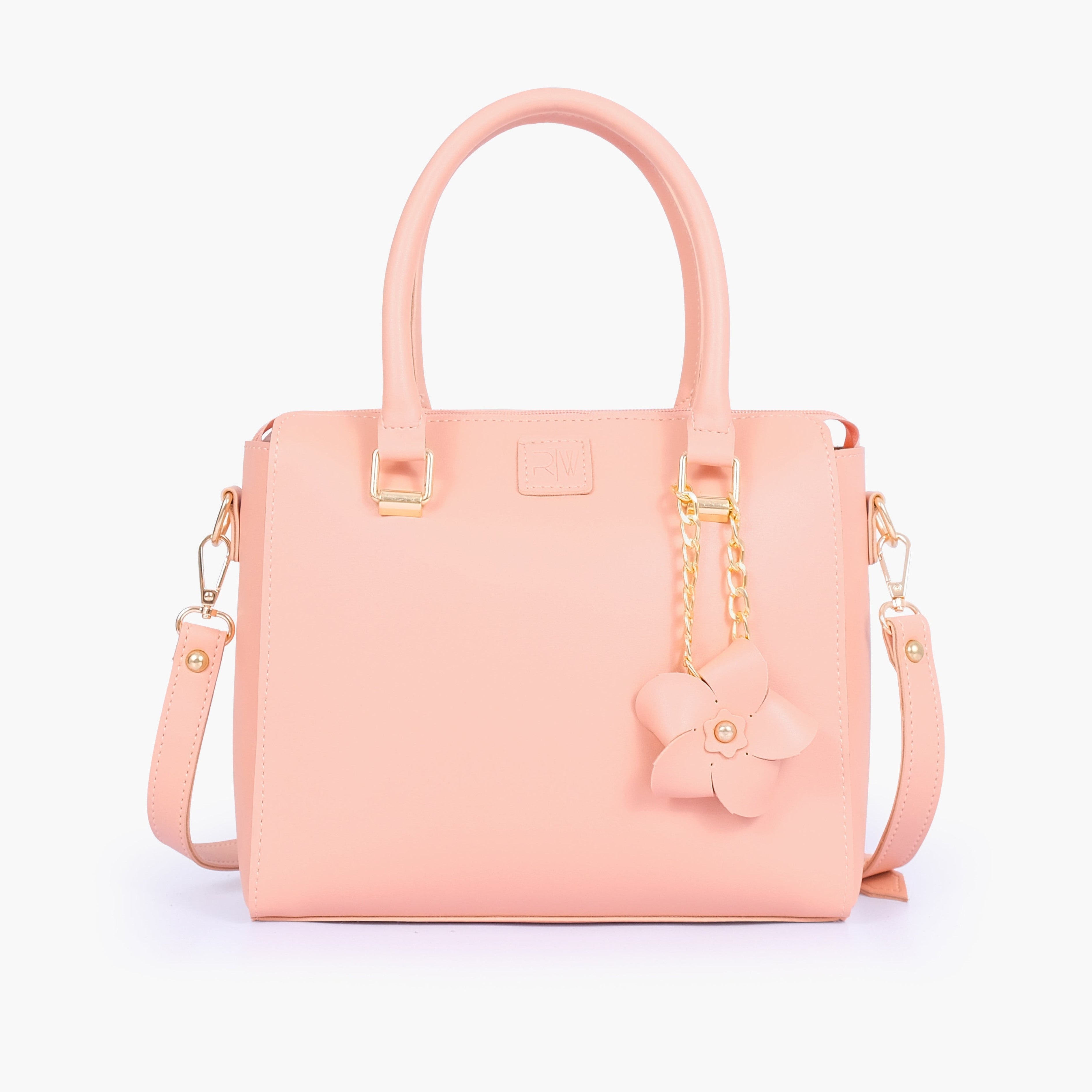 Peach handbag with flower charm