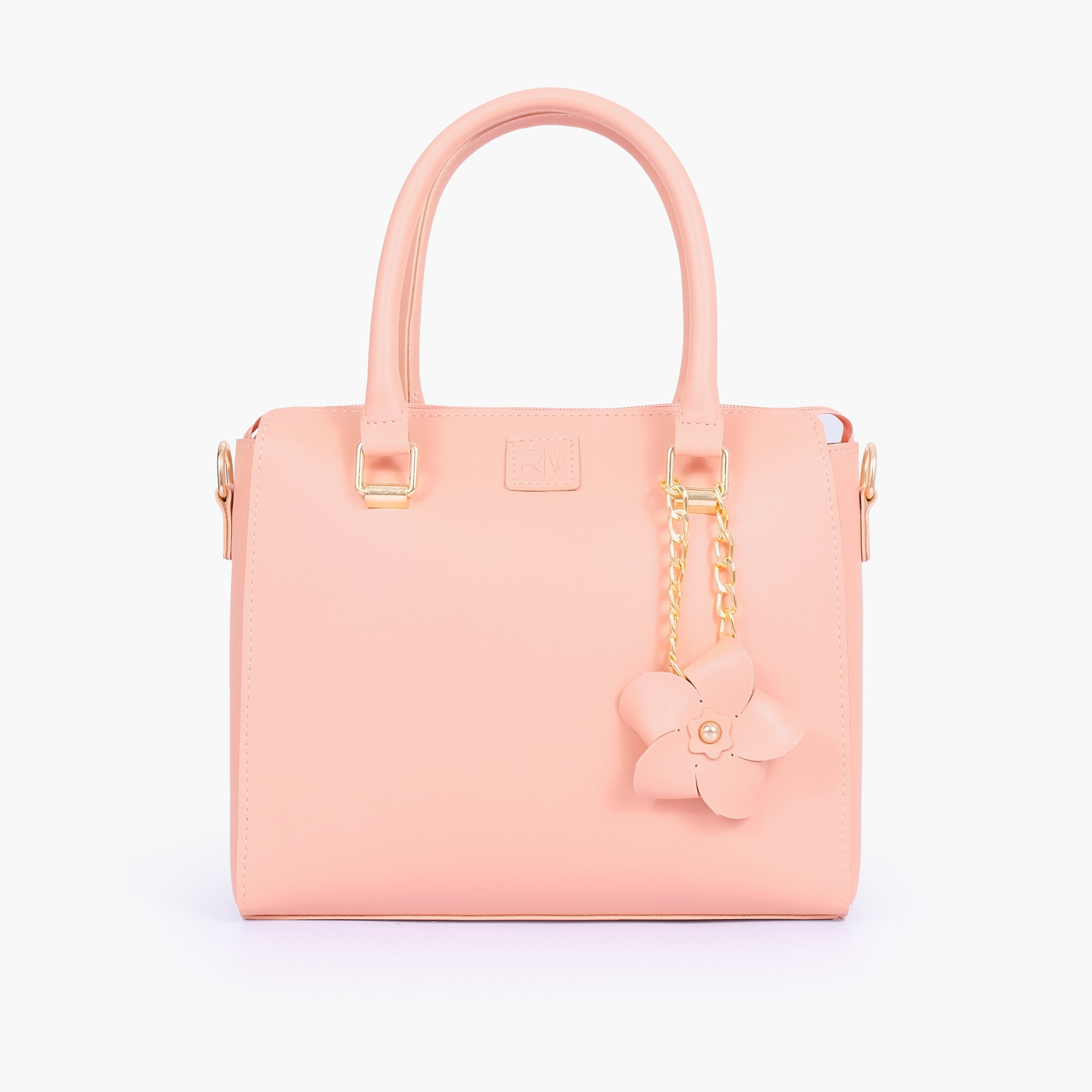 Peach handbag with flower charm
