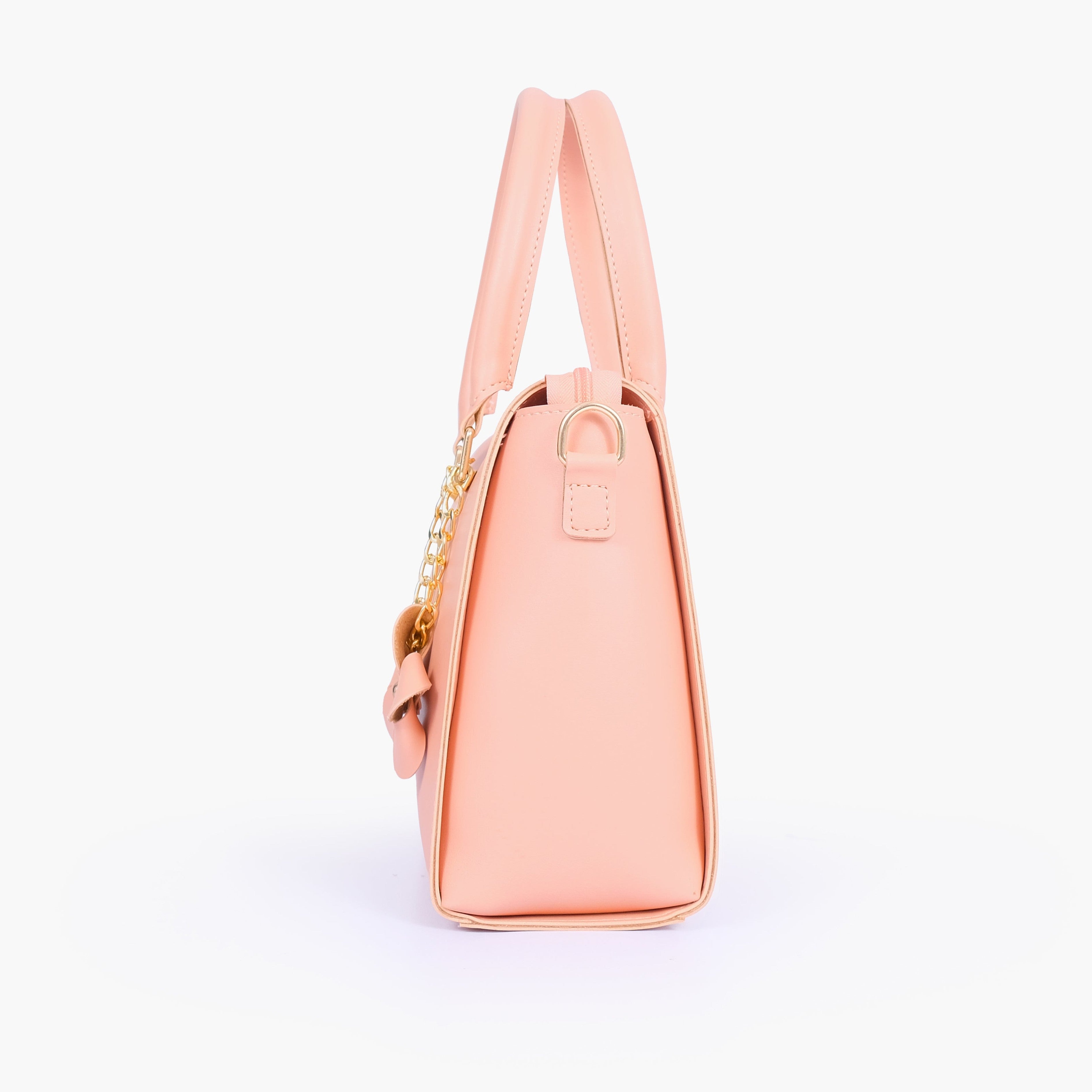 Peach handbag with flower charm