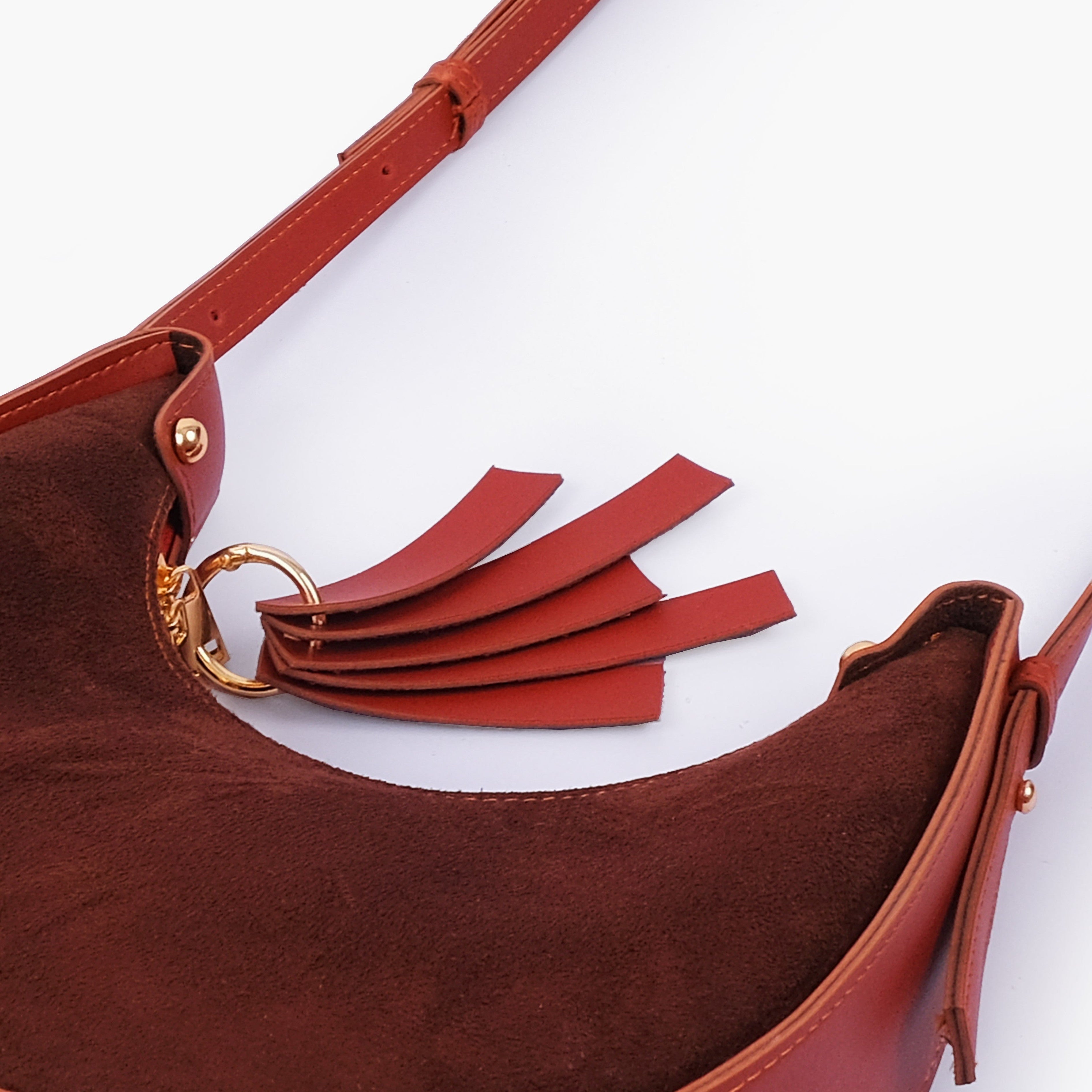 Rust suede crescent hobo bag