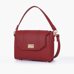 Maroon compact top-handle cross-body bag
