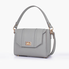 Grey compact top-handle cross-body bag