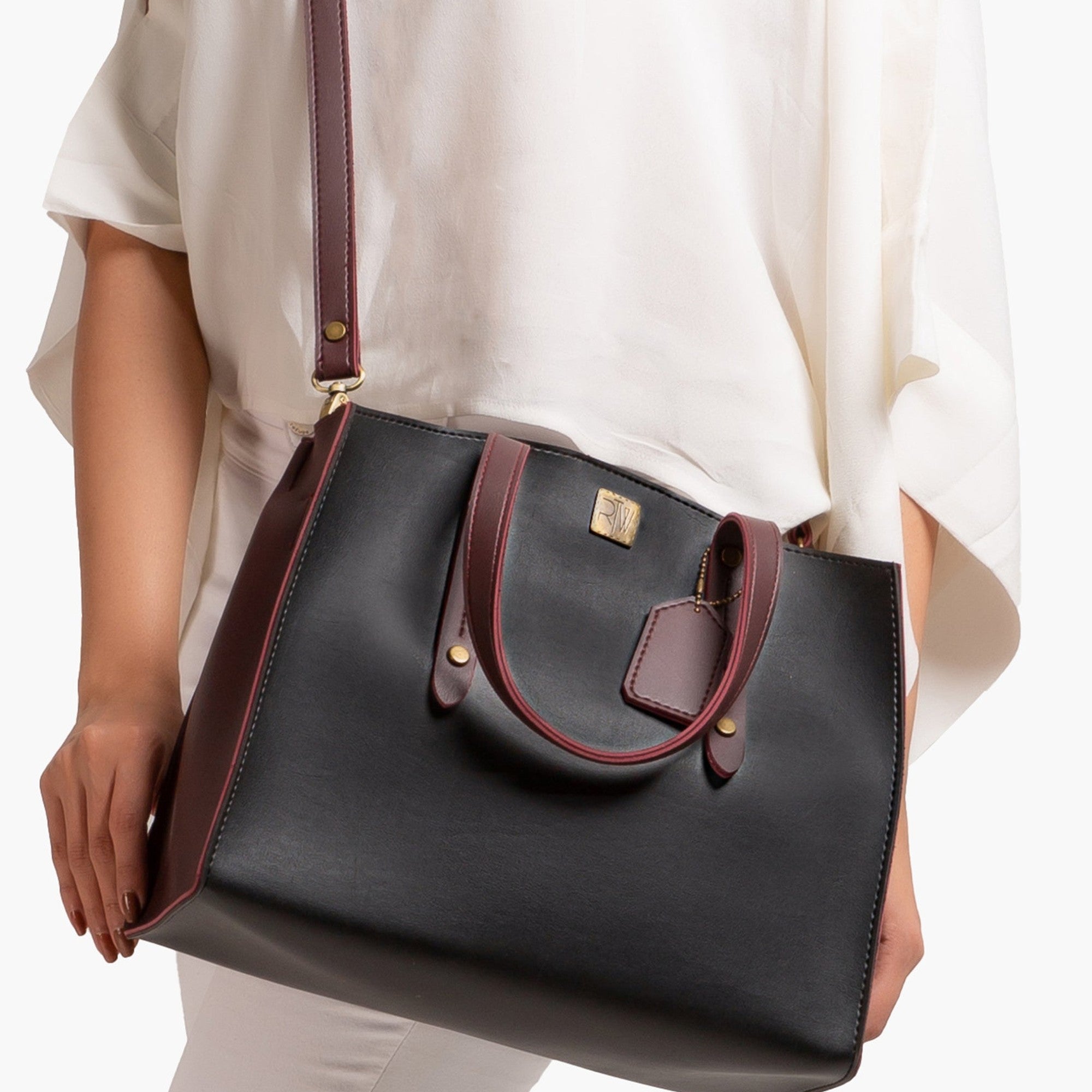 Black with burgundy multi compartment satchel bag