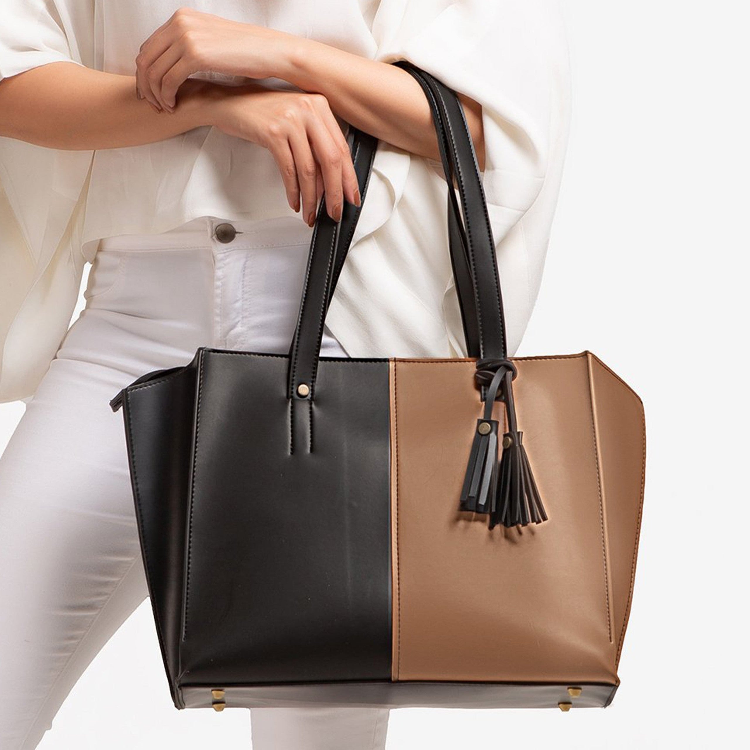 Tan and black over the shoulder tote bag