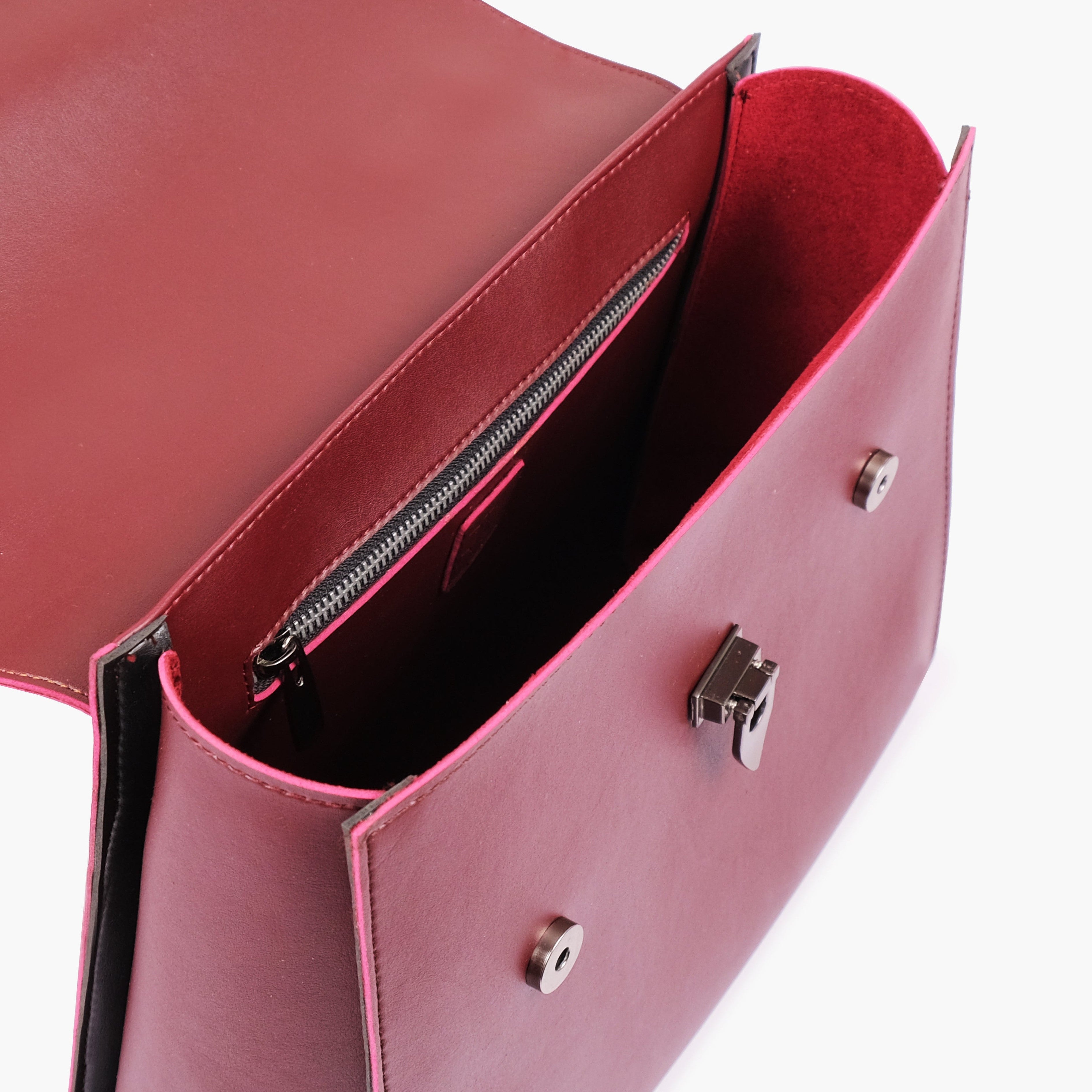 Burgundy flap-over top-handle bag