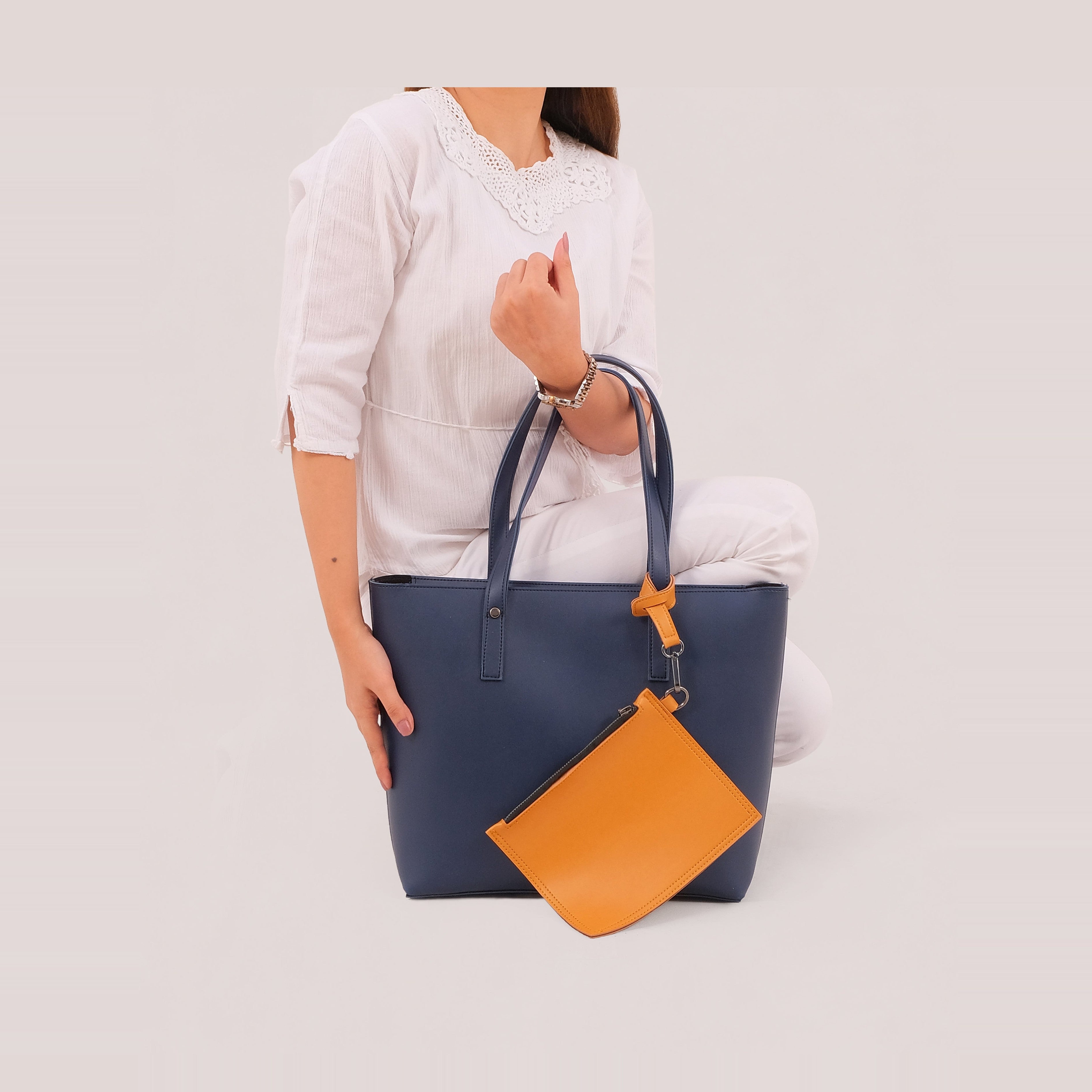 Blue tote bag with detachable pouch