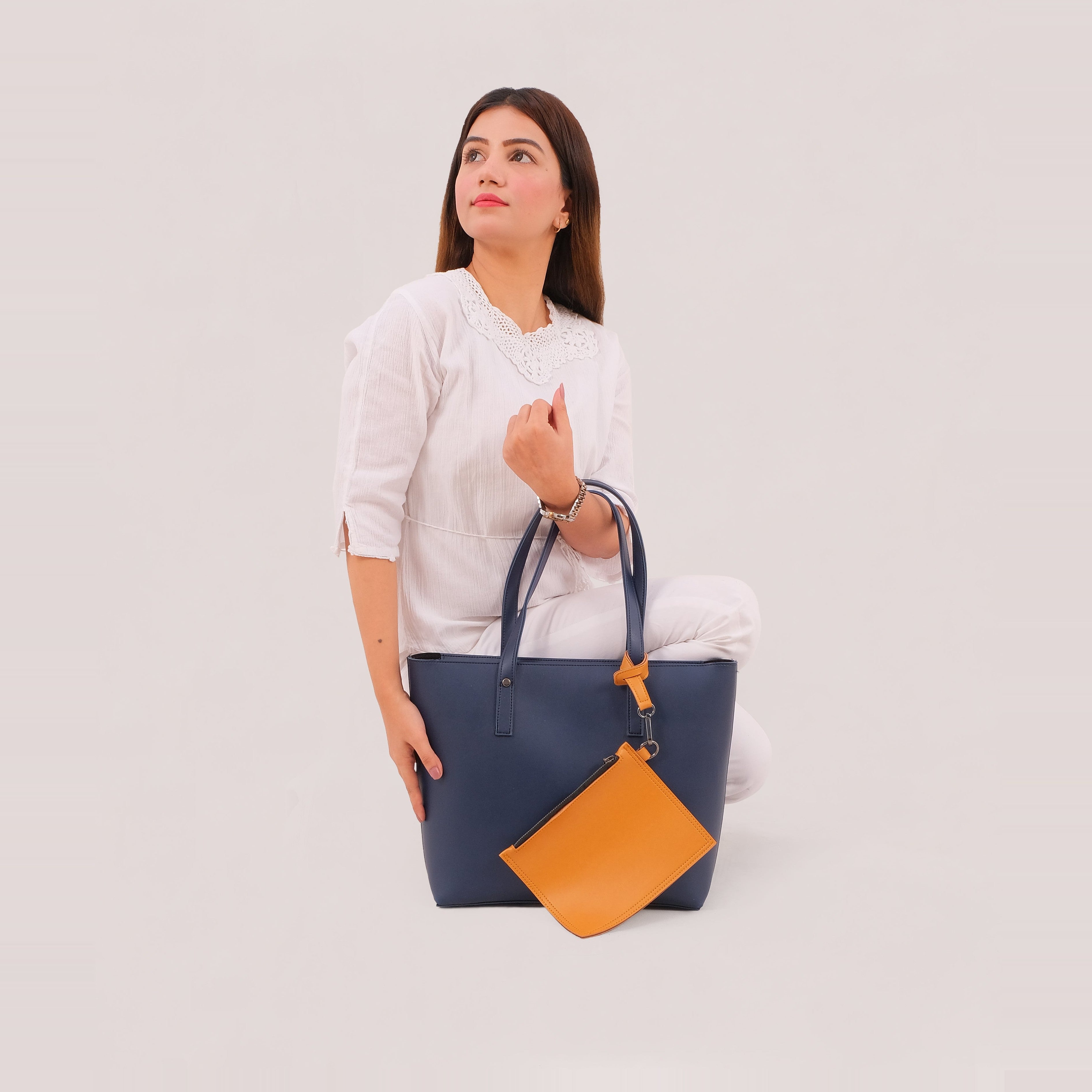 Blue tote bag with detachable pouch