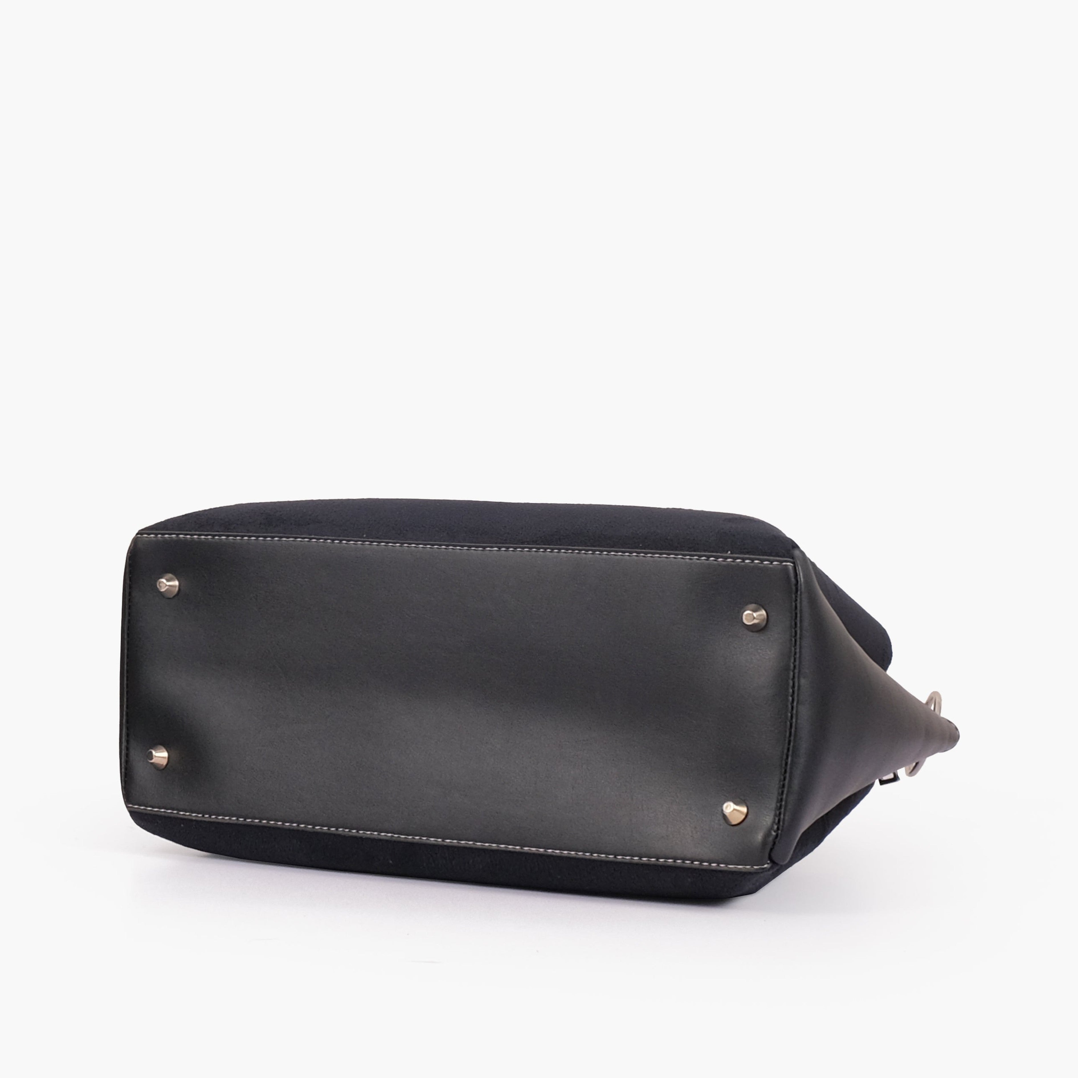 Black suede handbag with braided handle