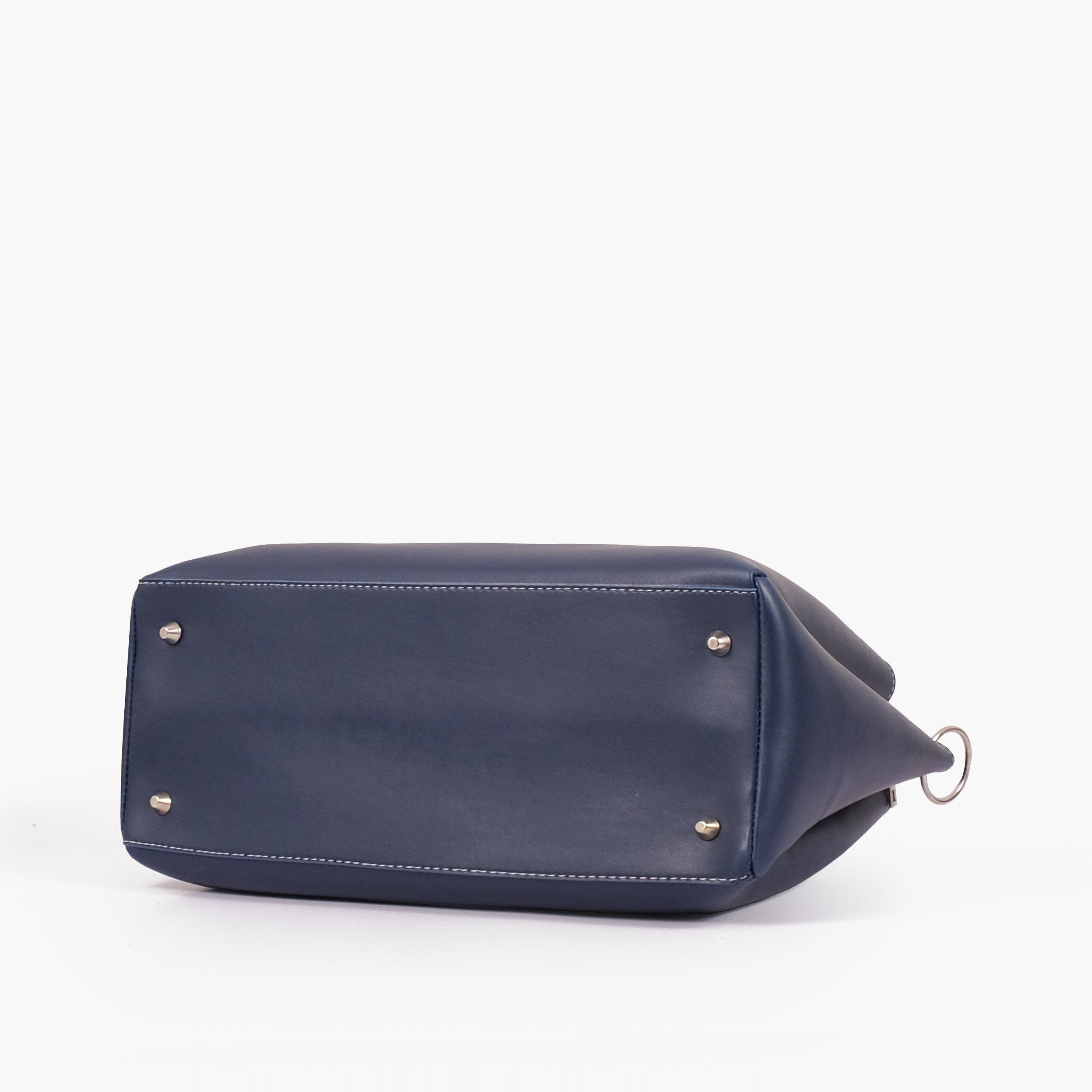 Blue handbag with braided handle