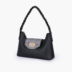 Black and white purse with braided strap